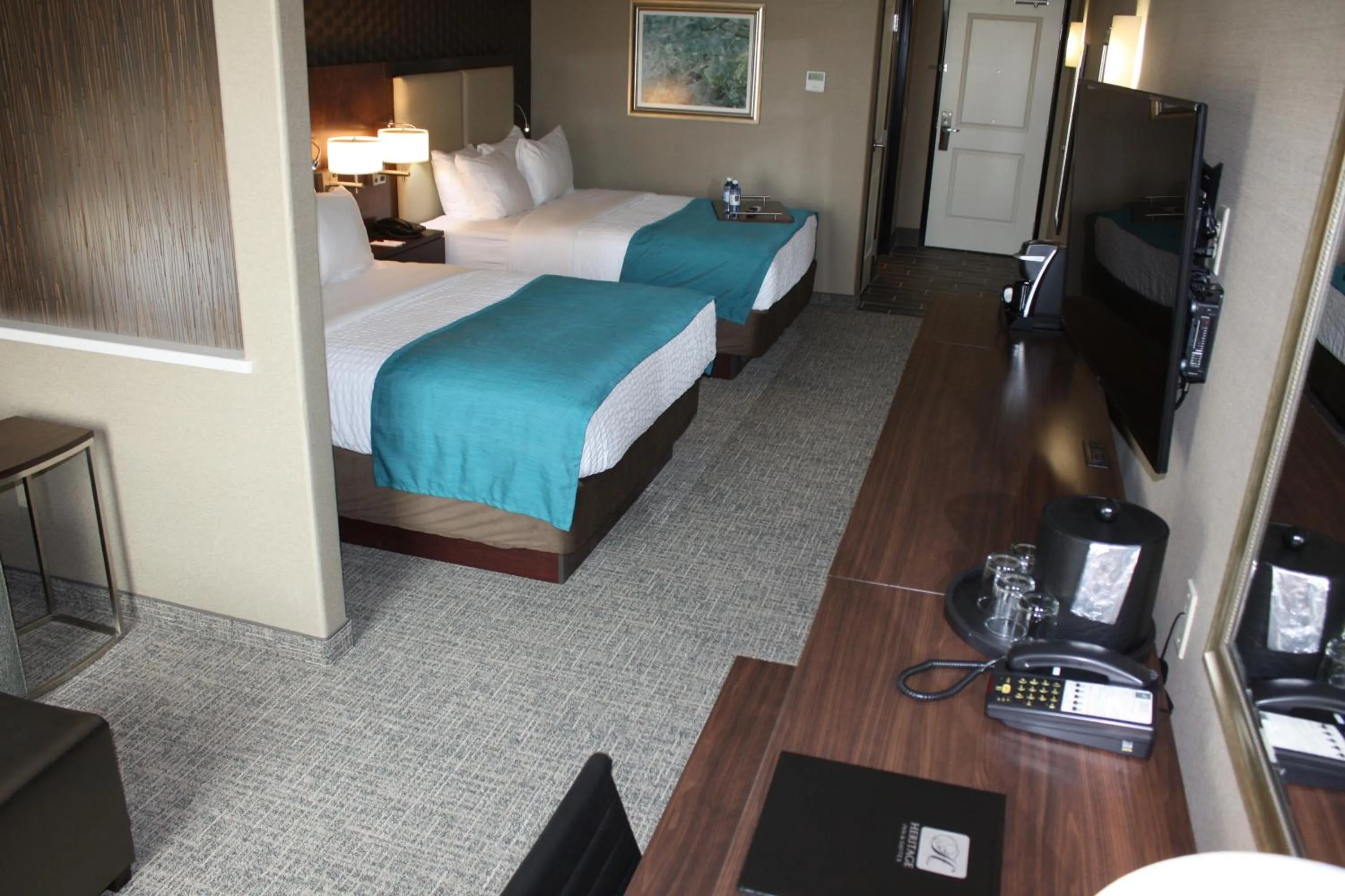 Photo of the whole room, Room Photo in The Heritage Inn & Suites, Ascend Hotel Collection
