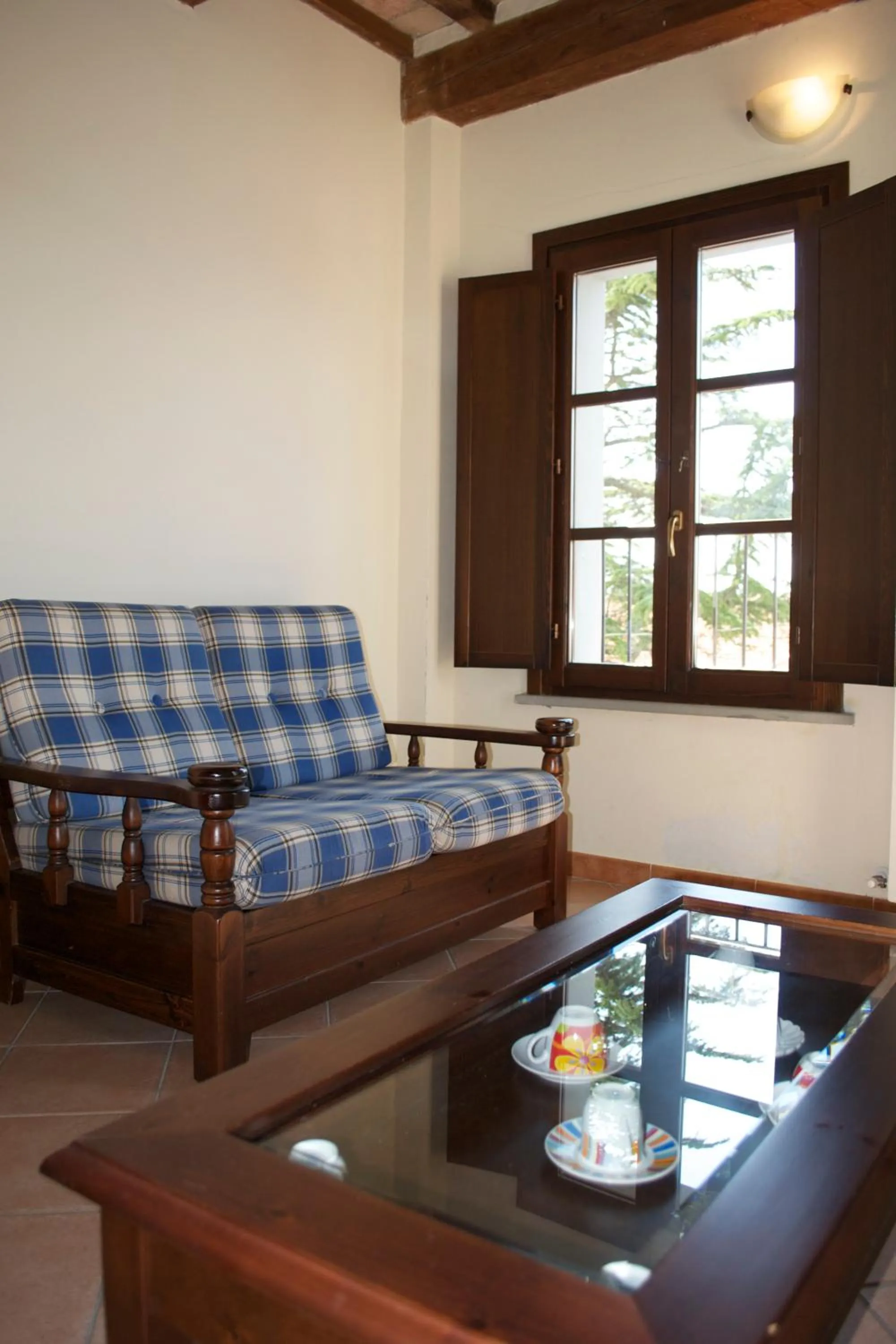 Communal lounge/ TV room in Residence Giuly Rosselmini