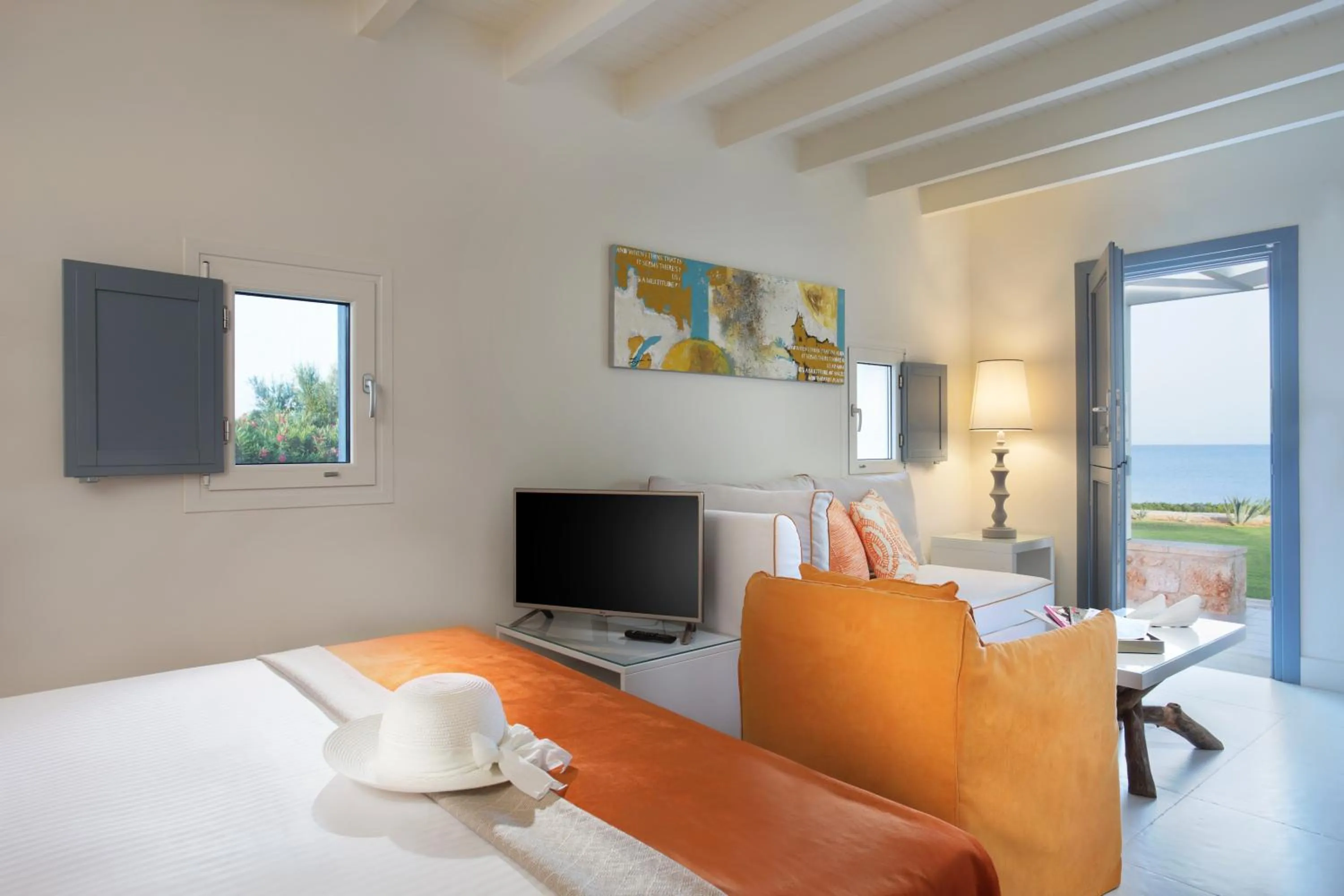 Seating area, Bed in Mareggio Exclusive Residences & Suites