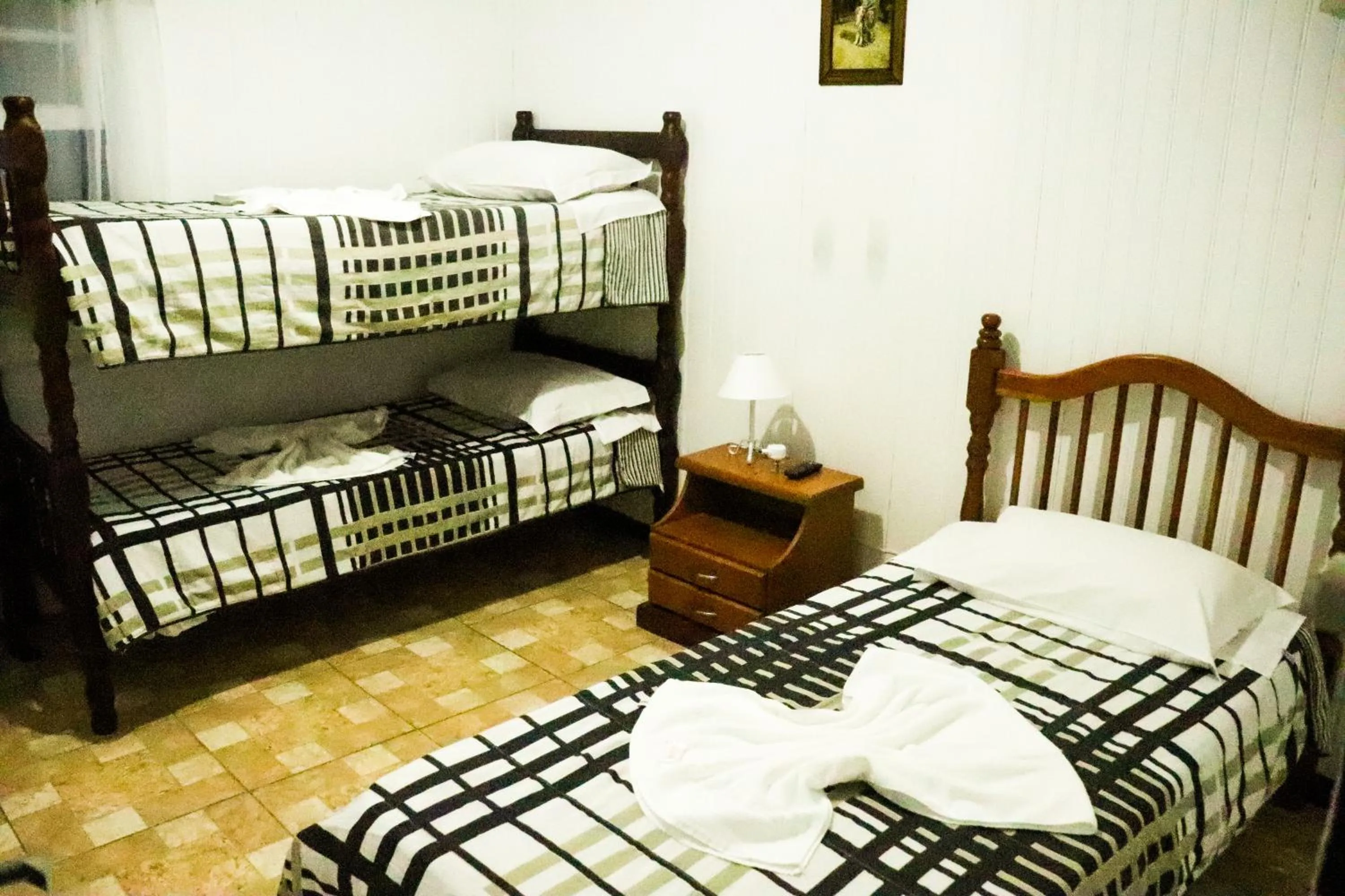 Photo of the whole room, Bed in Pousada Tia Leonor