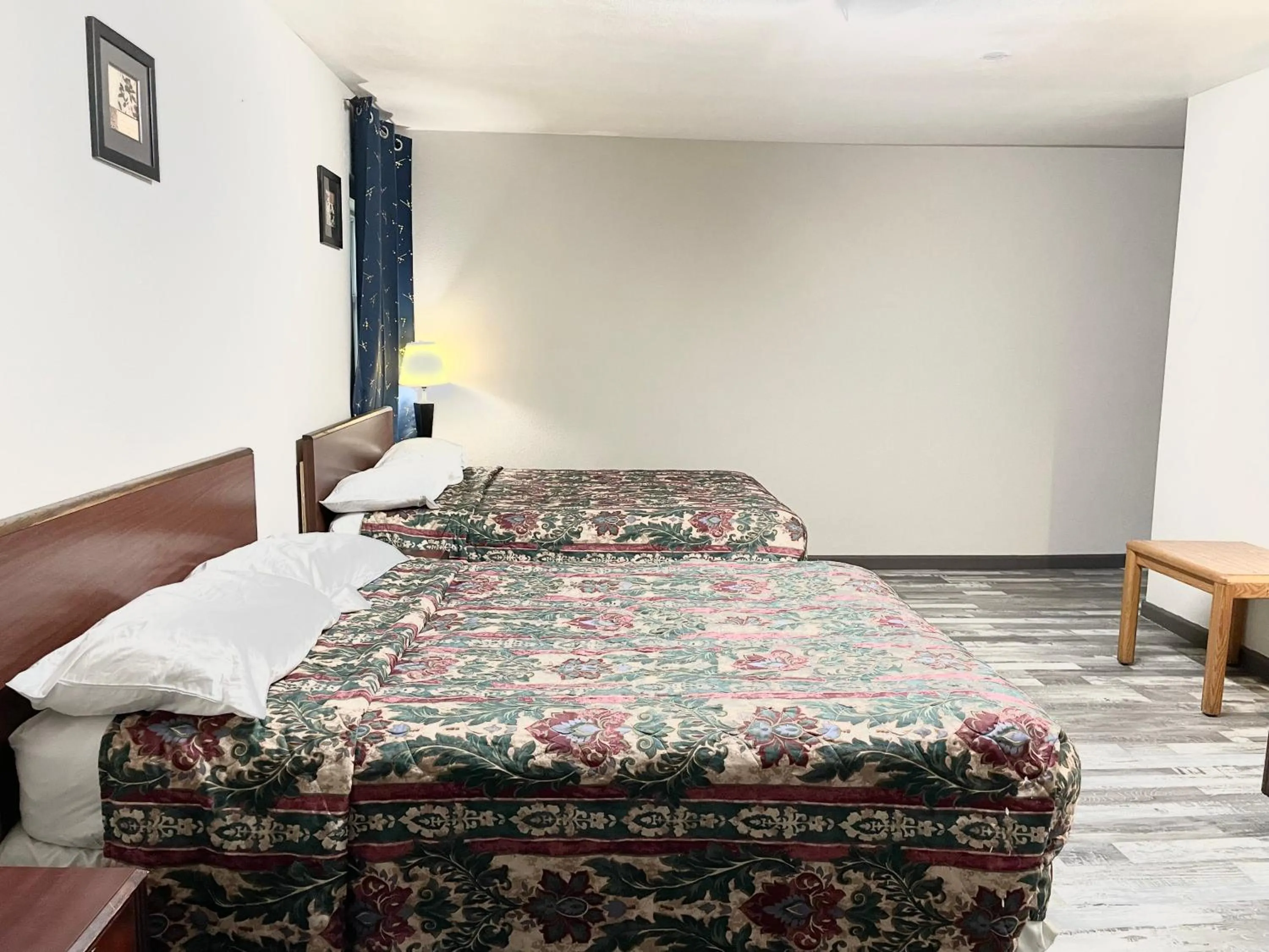 Bed in Azure Sky Motel