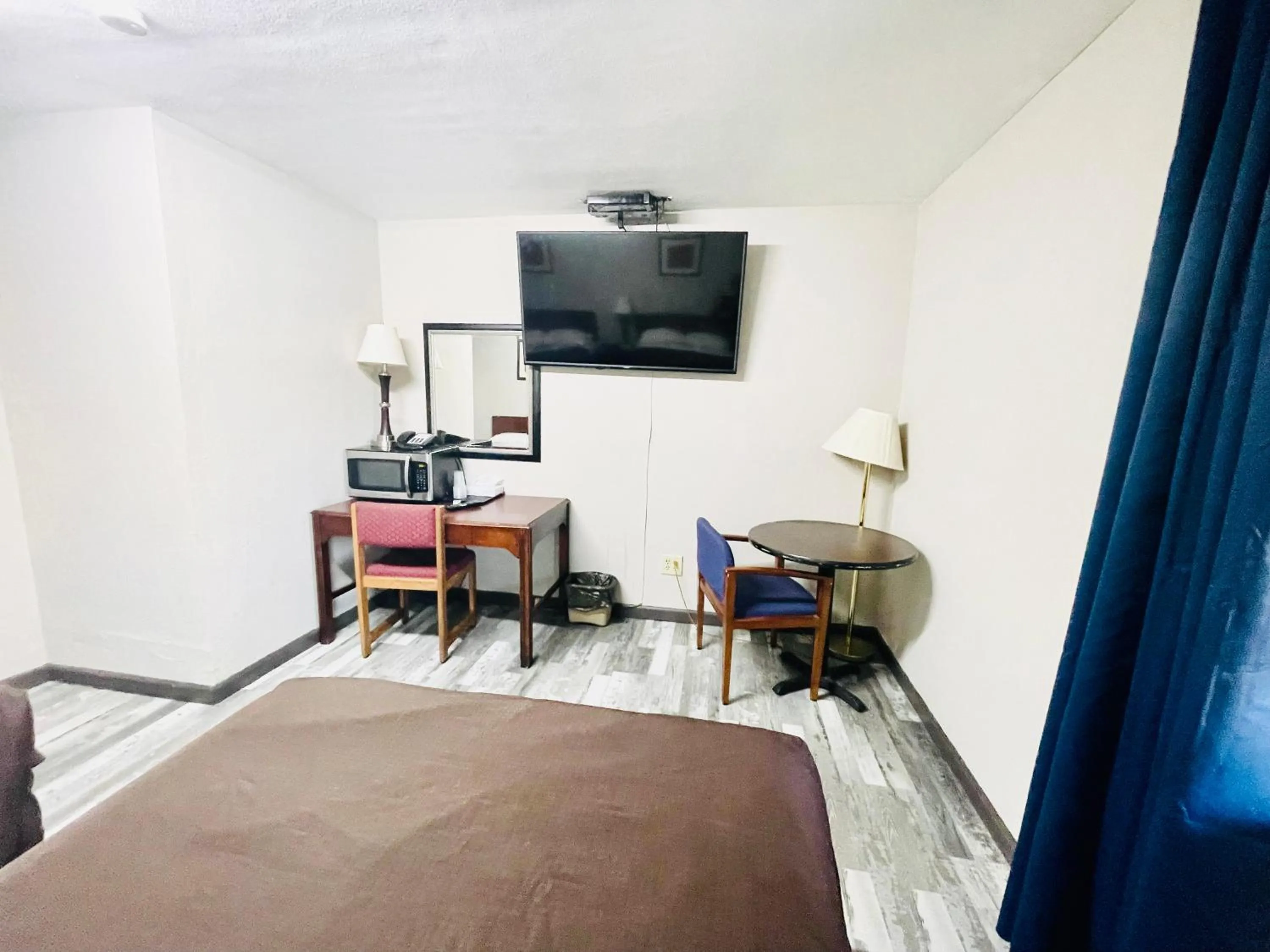 Bed in Azure Sky Motel