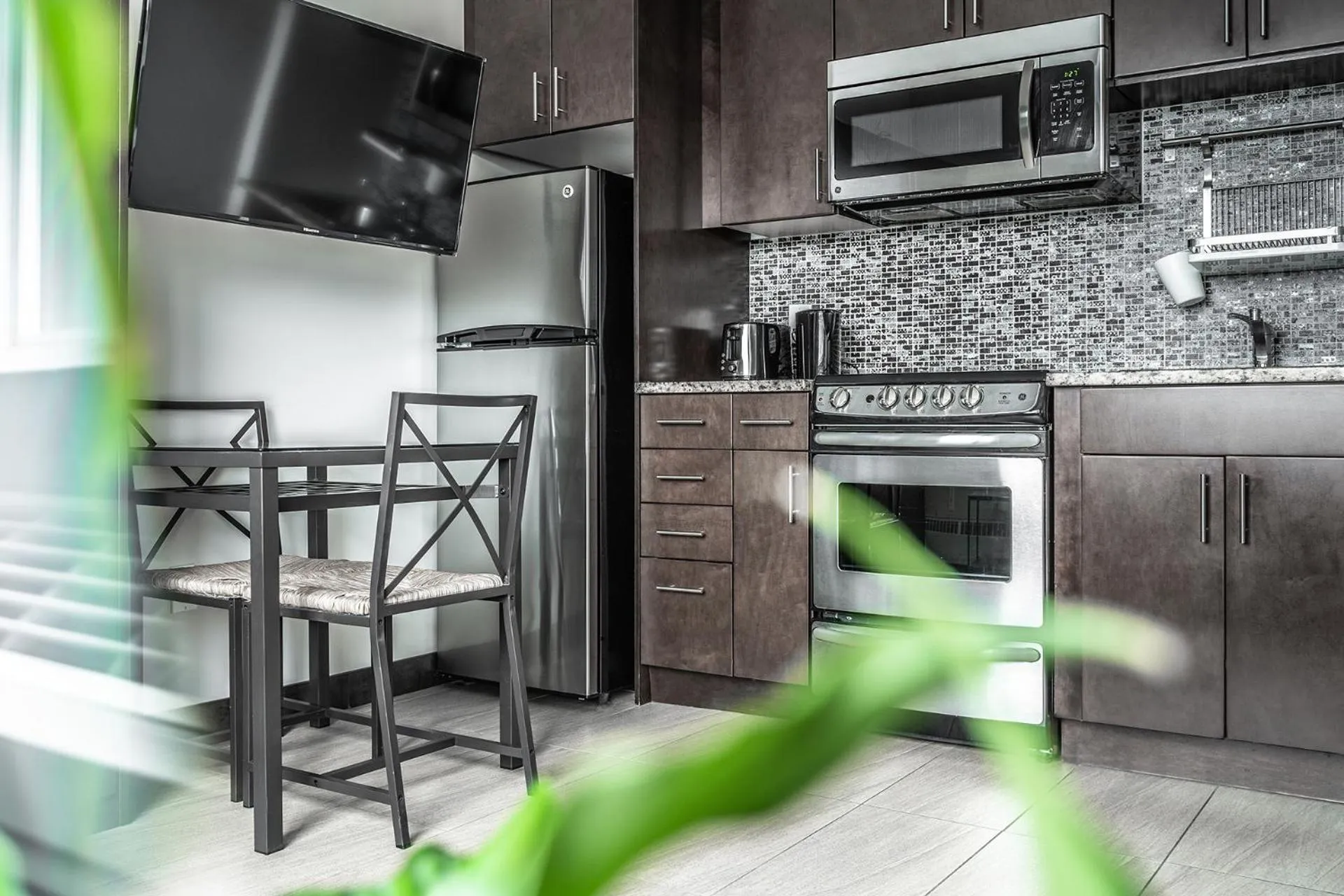 Kitchen or kitchenette in Cjour Apartments