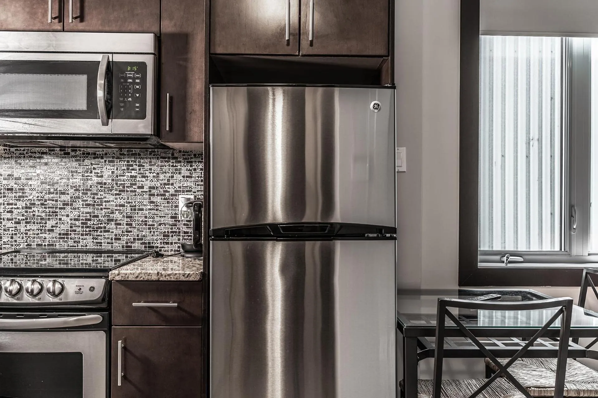 Kitchen or kitchenette in Cjour Apartments