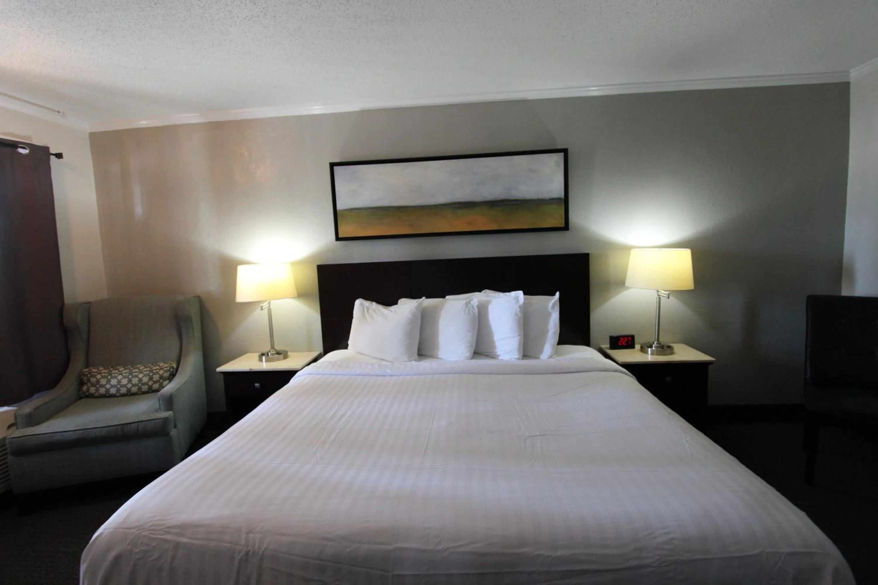 Bedroom, Bed in At Home Inn - Pensacola