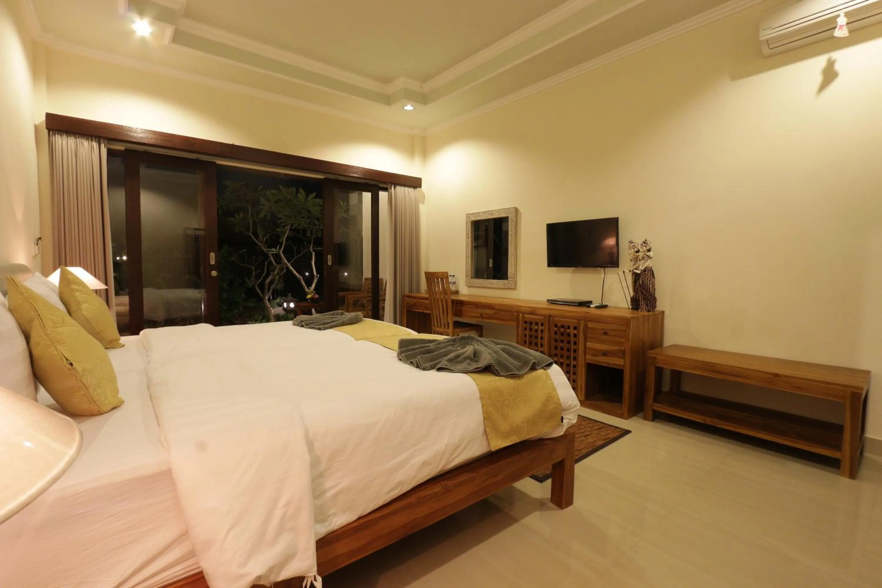 Photo of the whole room, Bed in Duana Sari by Mahaputra