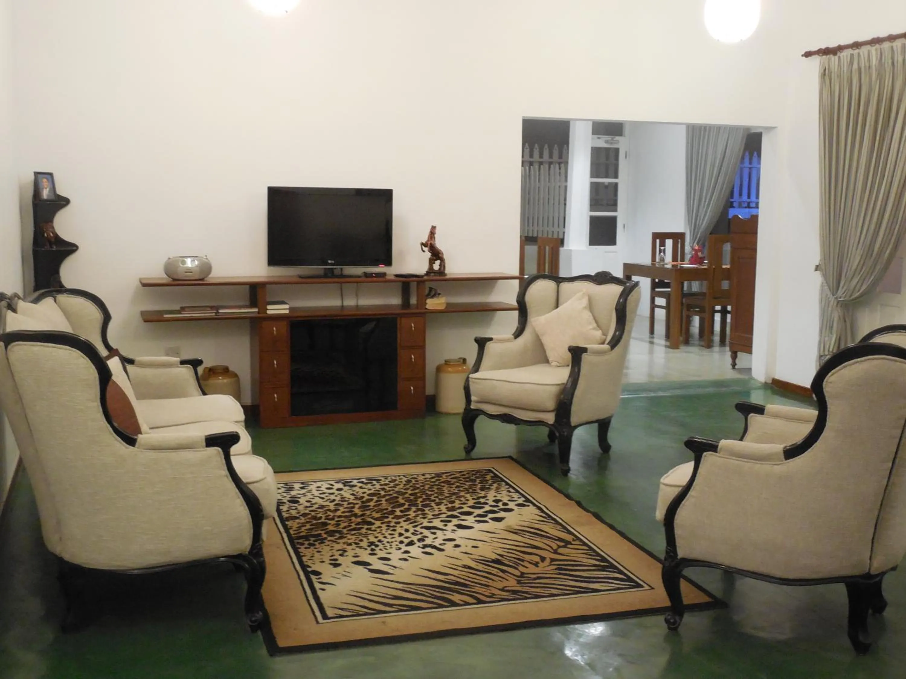 Communal lounge/ TV room in Villa Perpetua