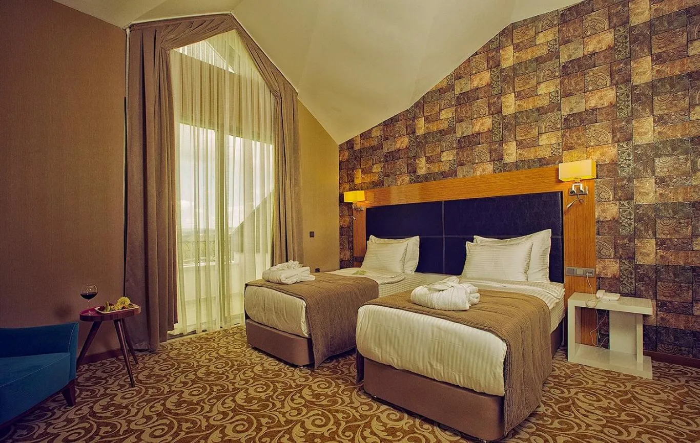 Bed in Elgarden Hotel & Spa