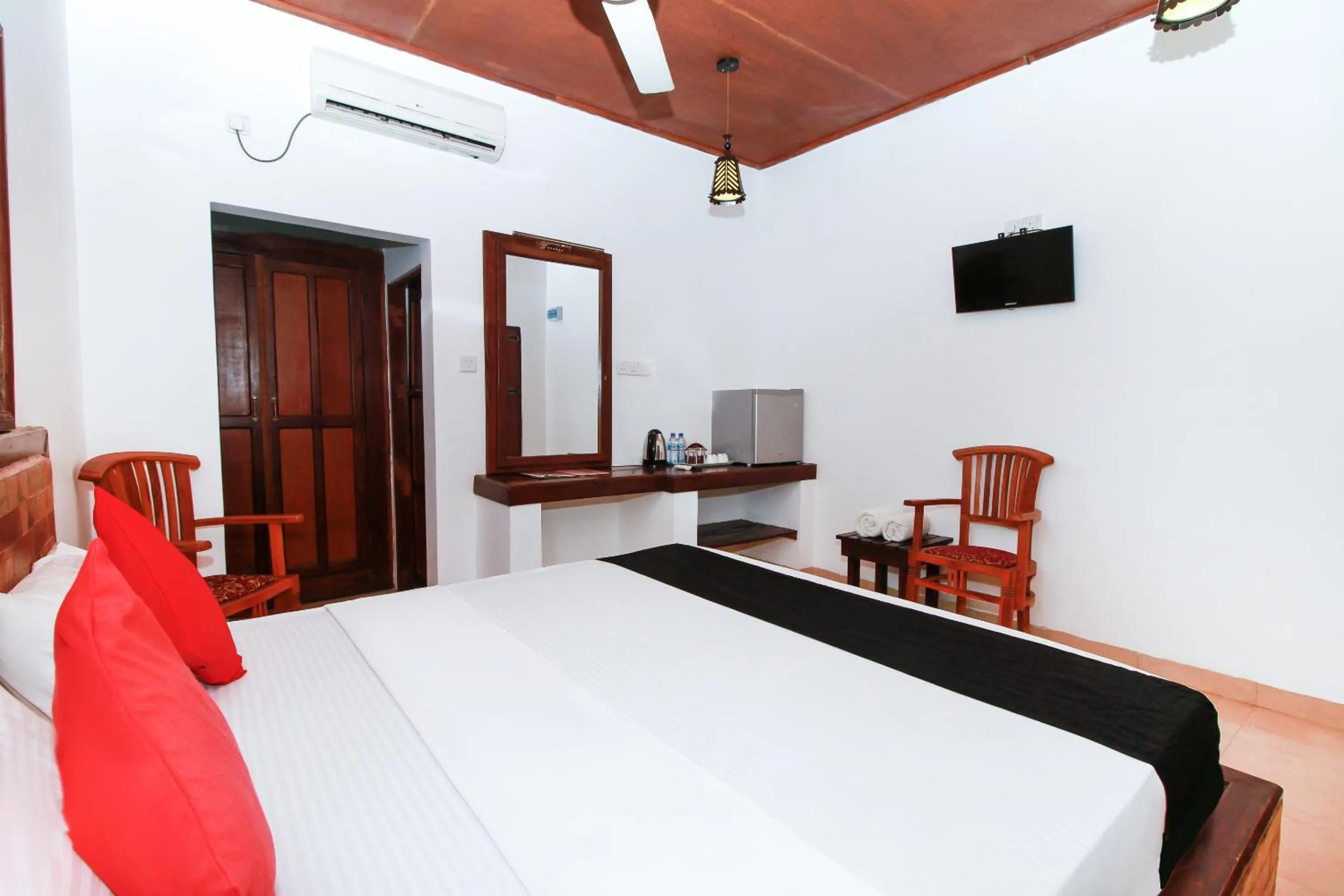 Bed in JKAB Beach Resort