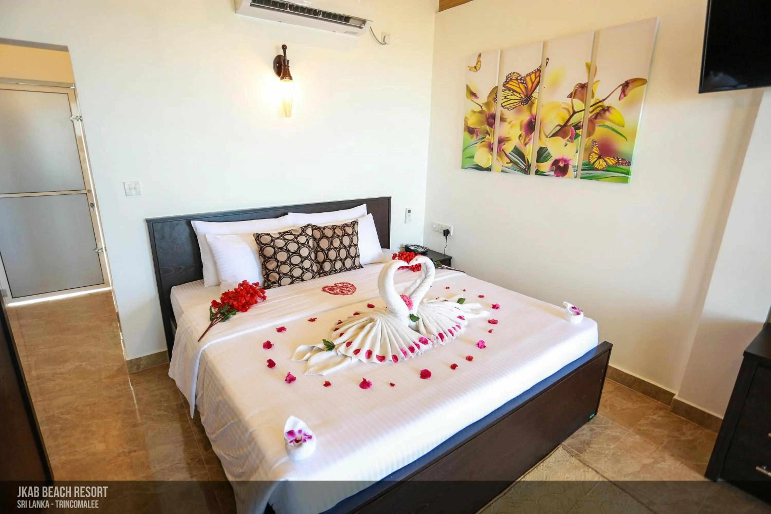Bed in JKAB Beach Resort