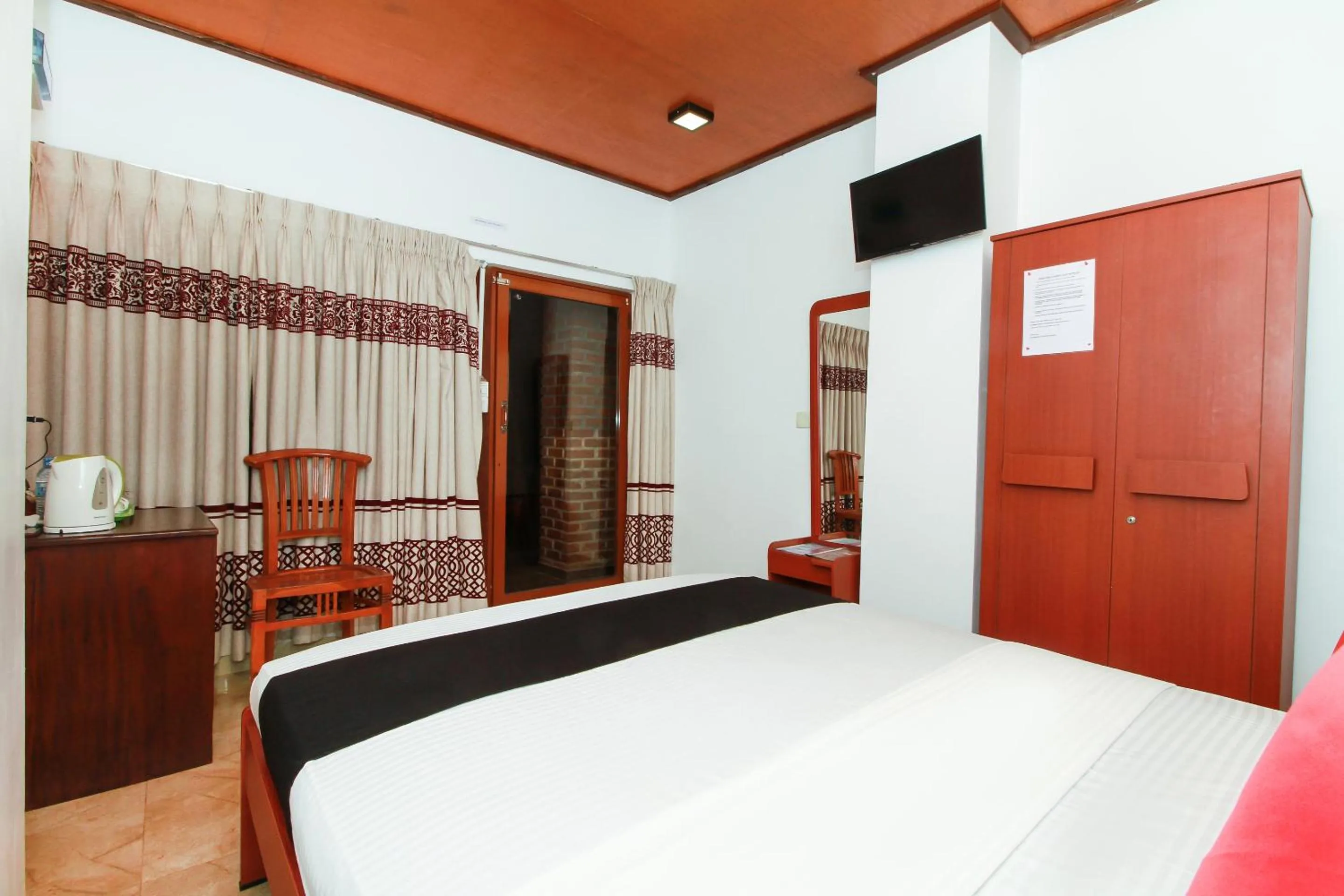 Bed in JKAB Beach Resort