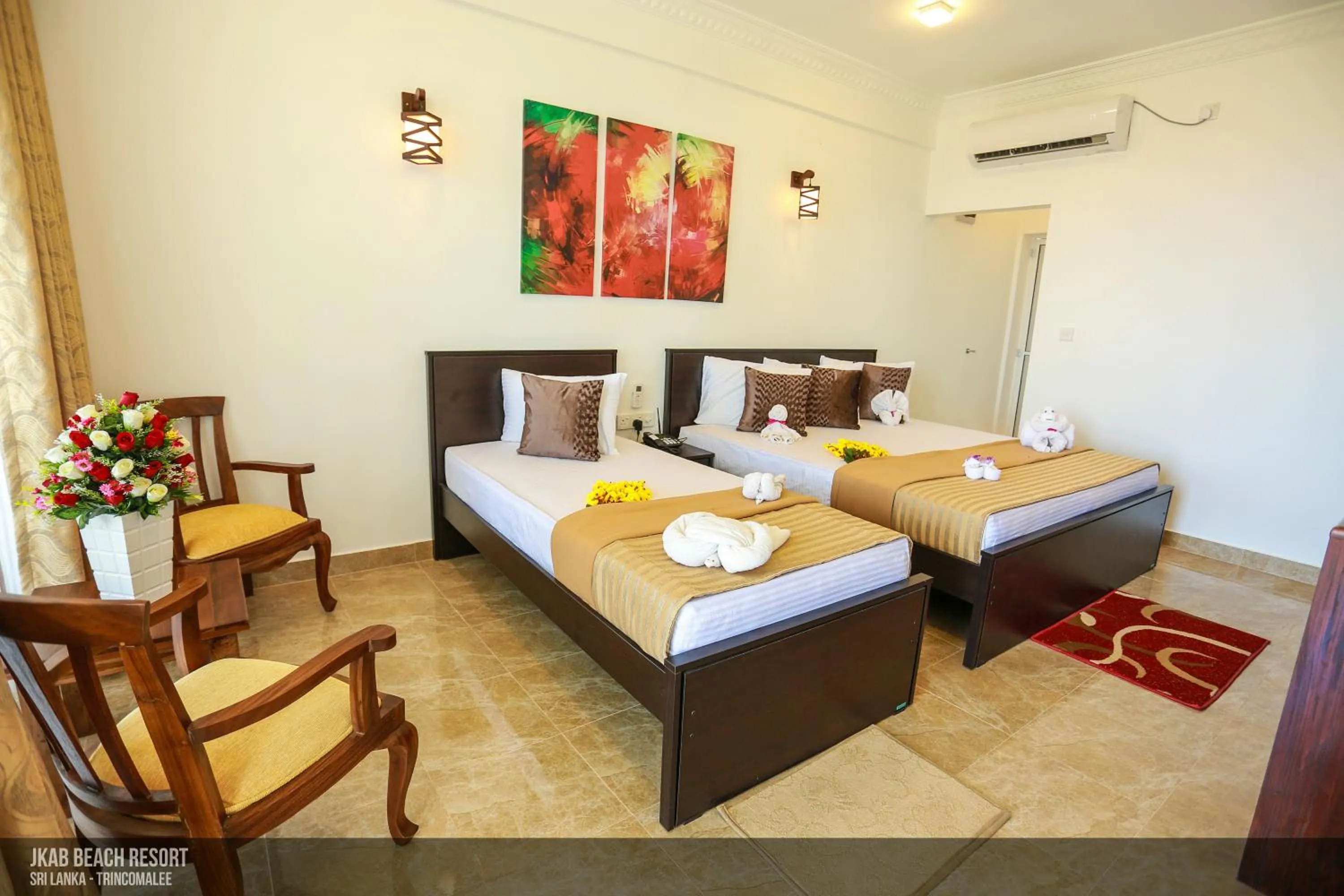 Bed in JKAB Beach Resort