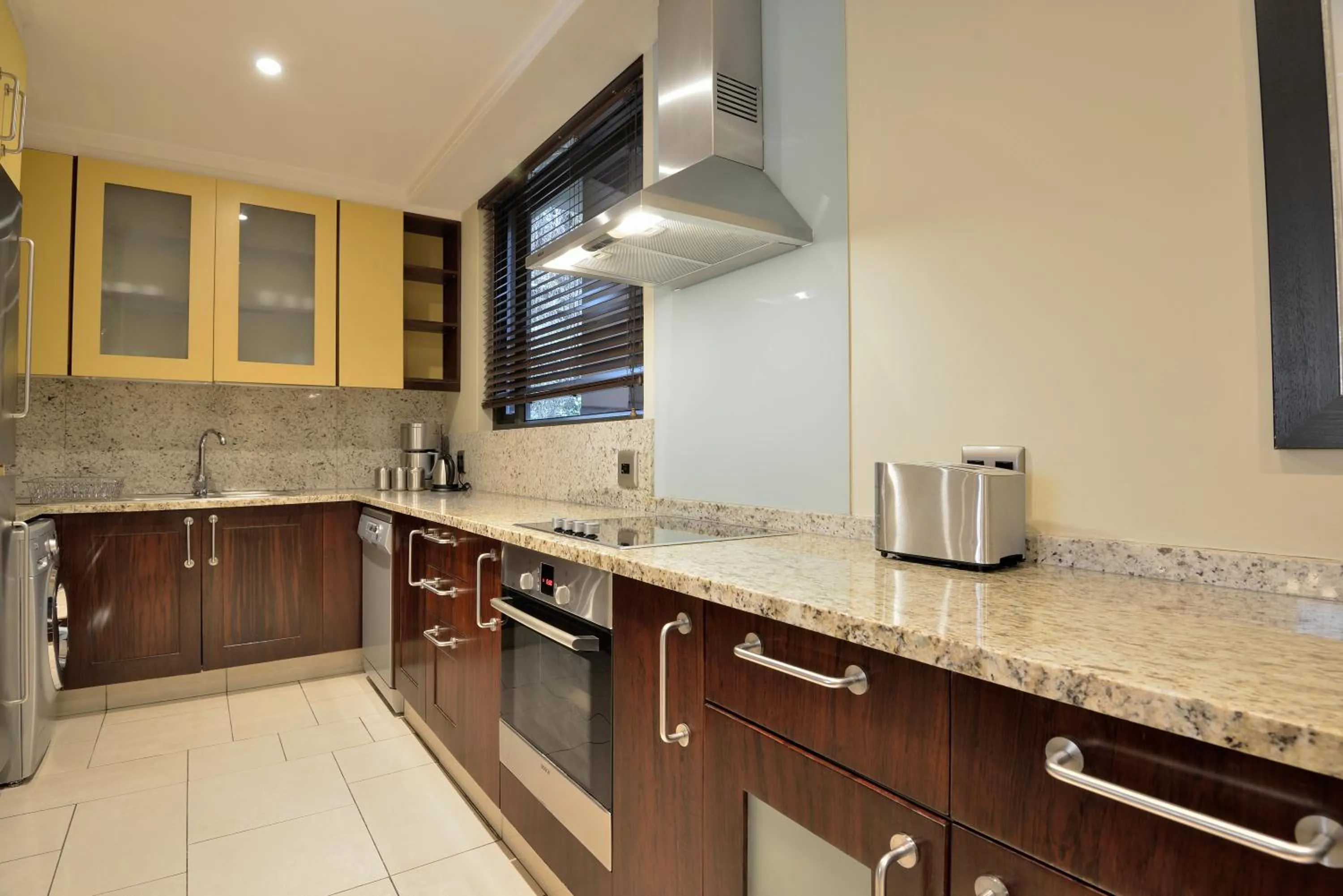 Kitchen or kitchenette in Raphael Suites