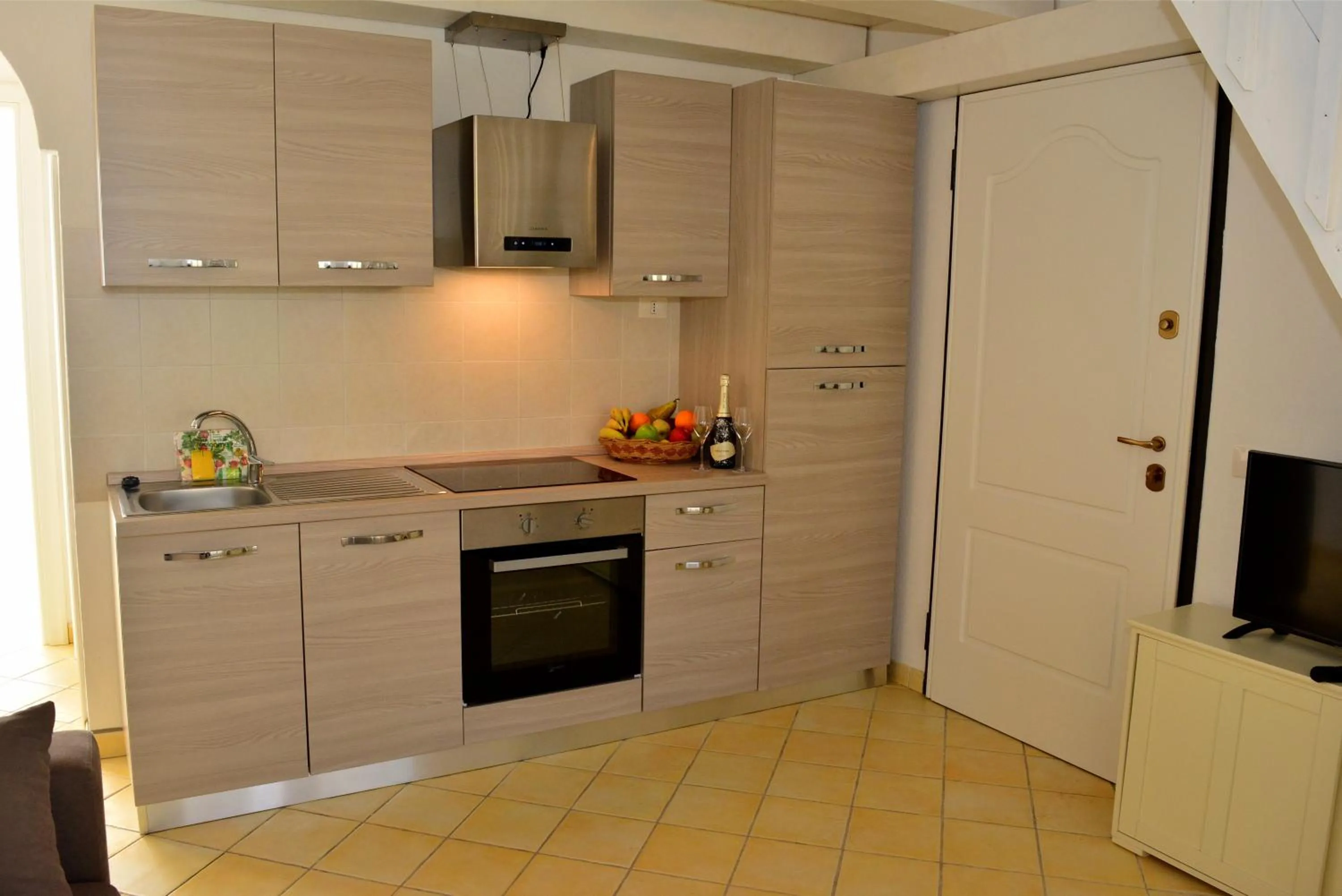 Kitchen or kitchenette in Appartamenti Residence Zodiaco
