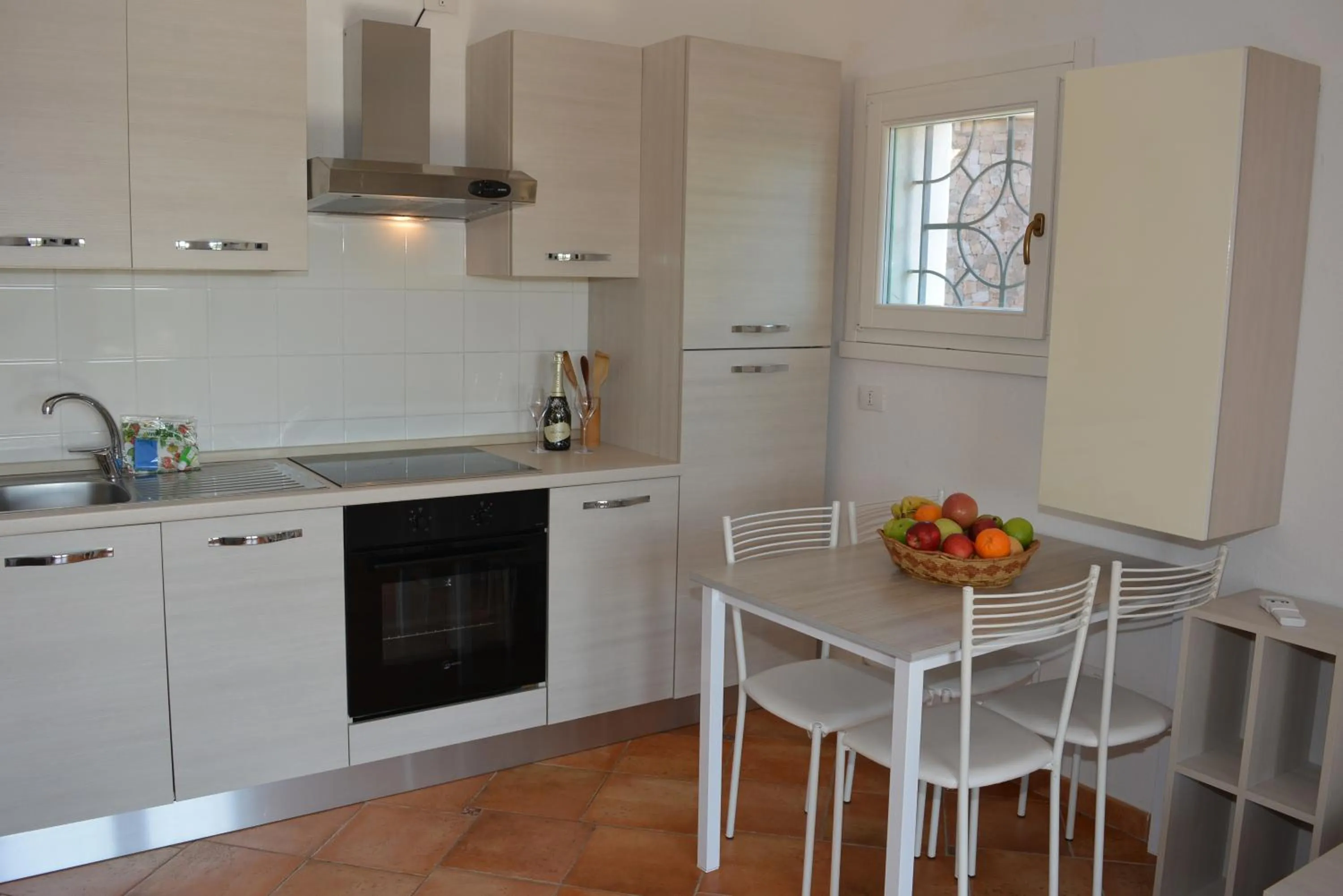 Kitchen or kitchenette in Appartamenti Residence Zodiaco