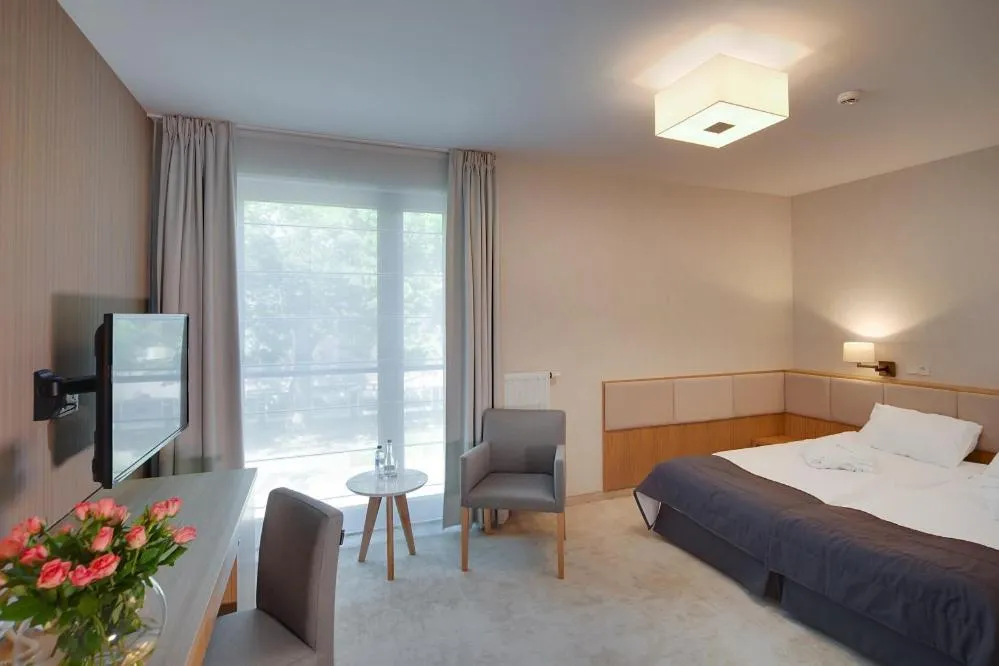 Property building, Bed in Eva Park Life & Spa