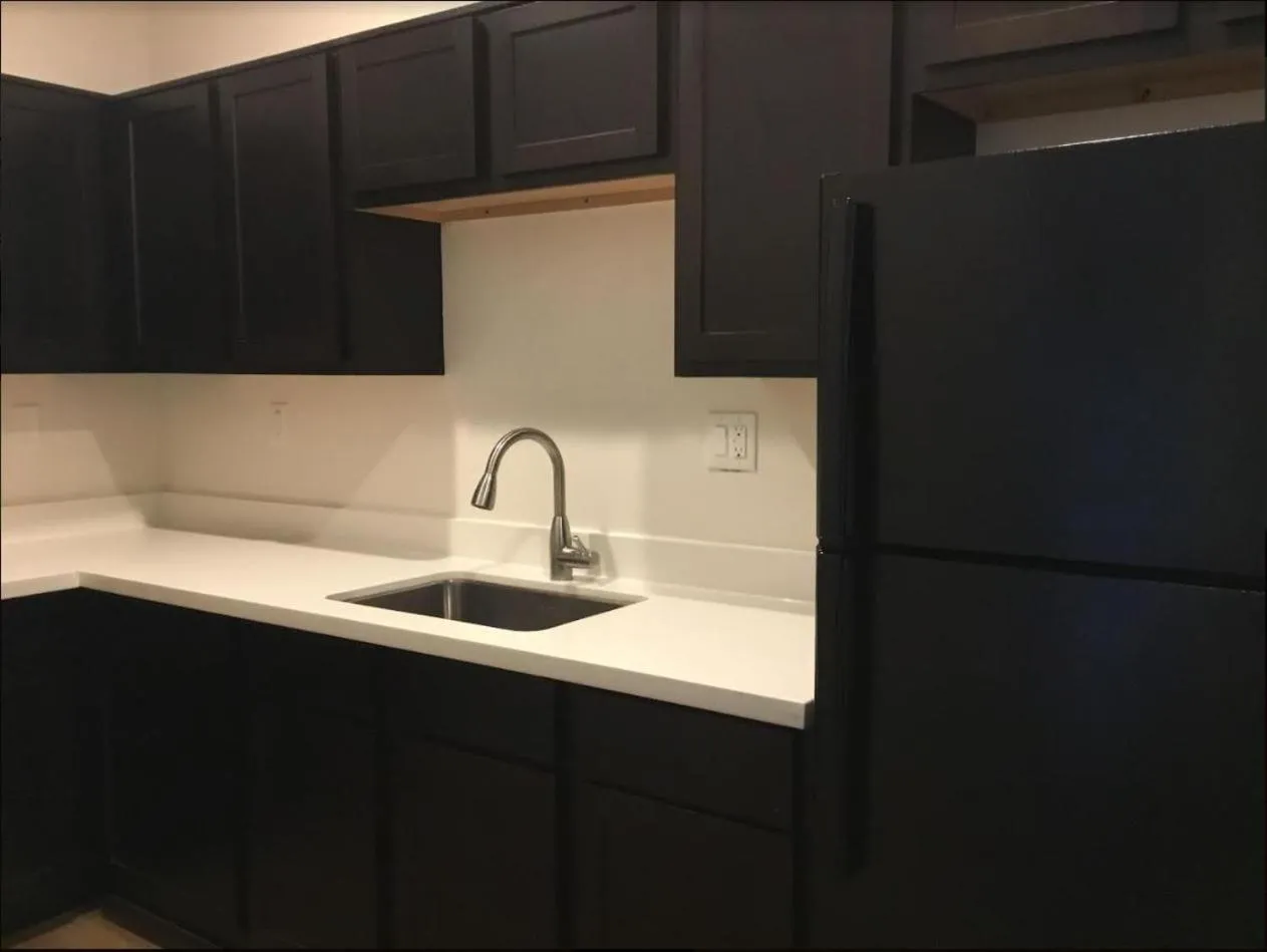 Communal kitchen in Palace Inn Blue City Centre