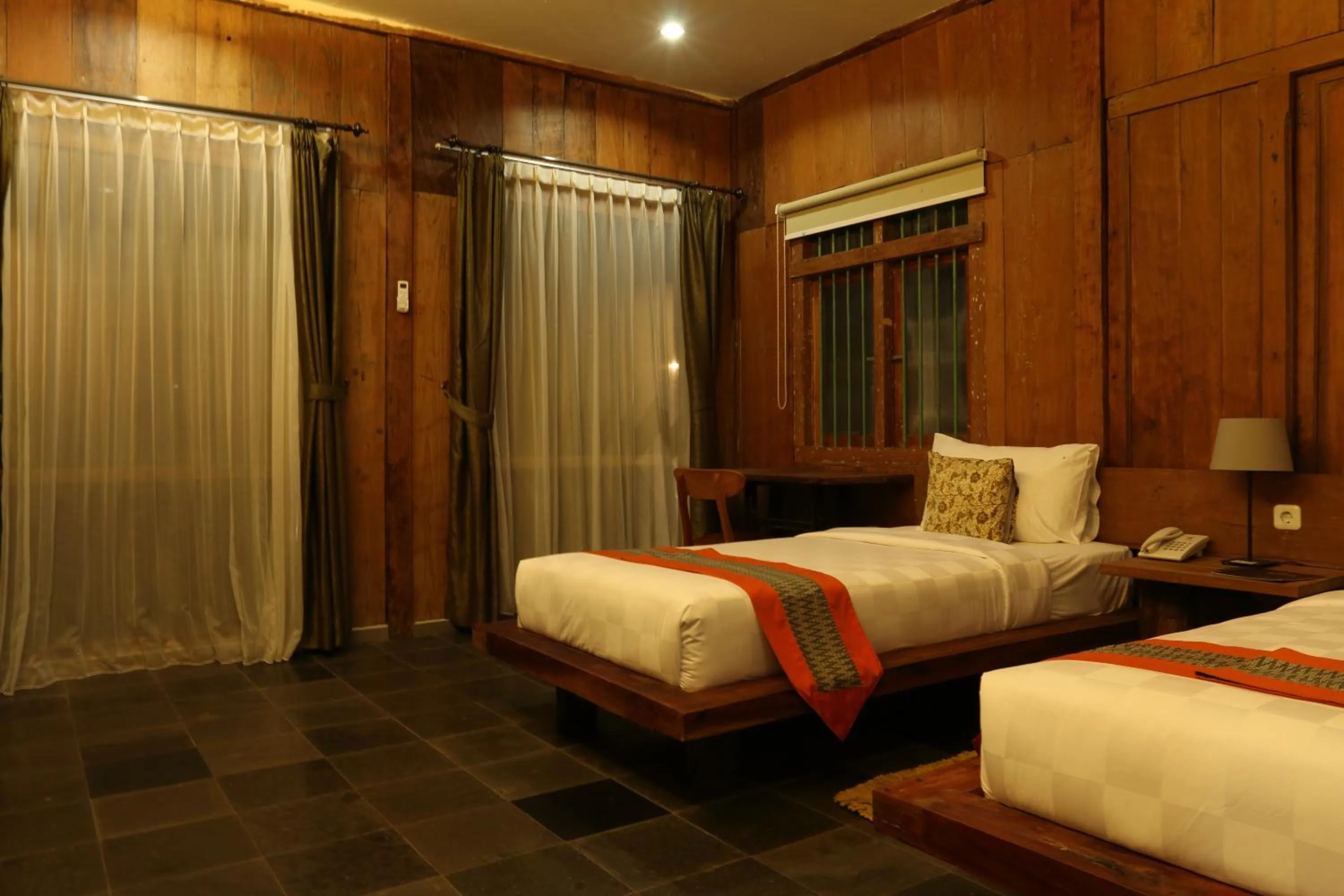 Bed in WARISAN Heritage Boutique Hotel