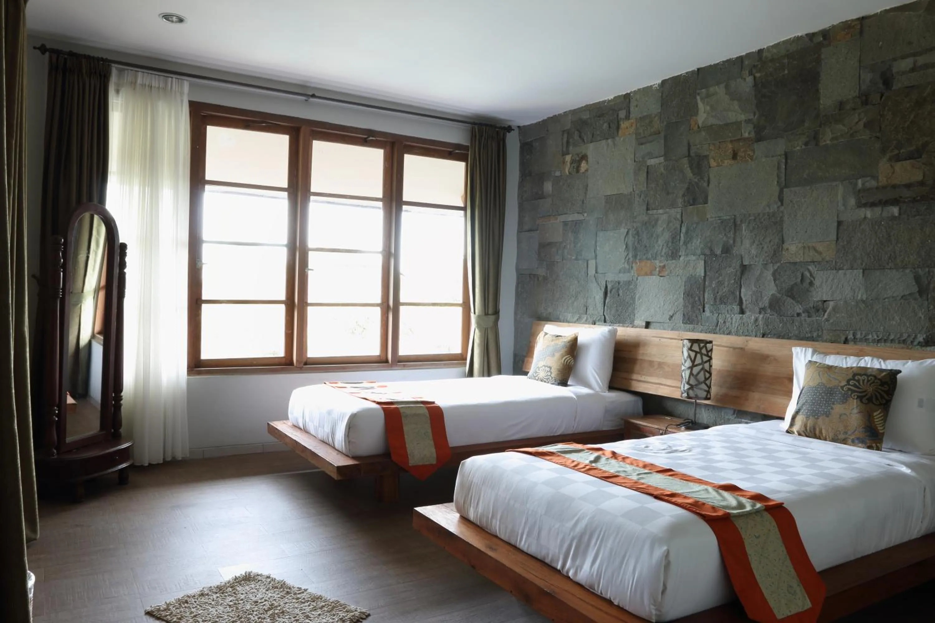 Bed in WARISAN Heritage Boutique Hotel