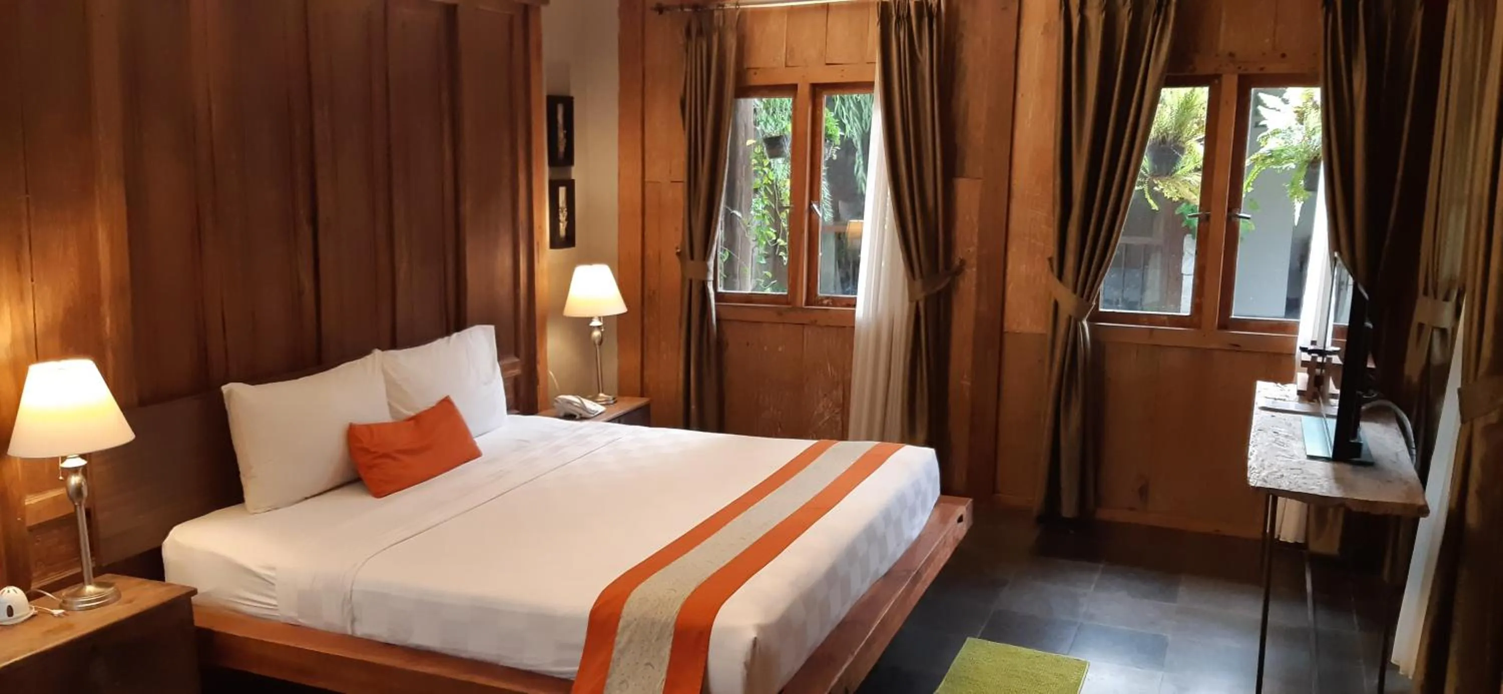 Bed in WARISAN Heritage Boutique Hotel