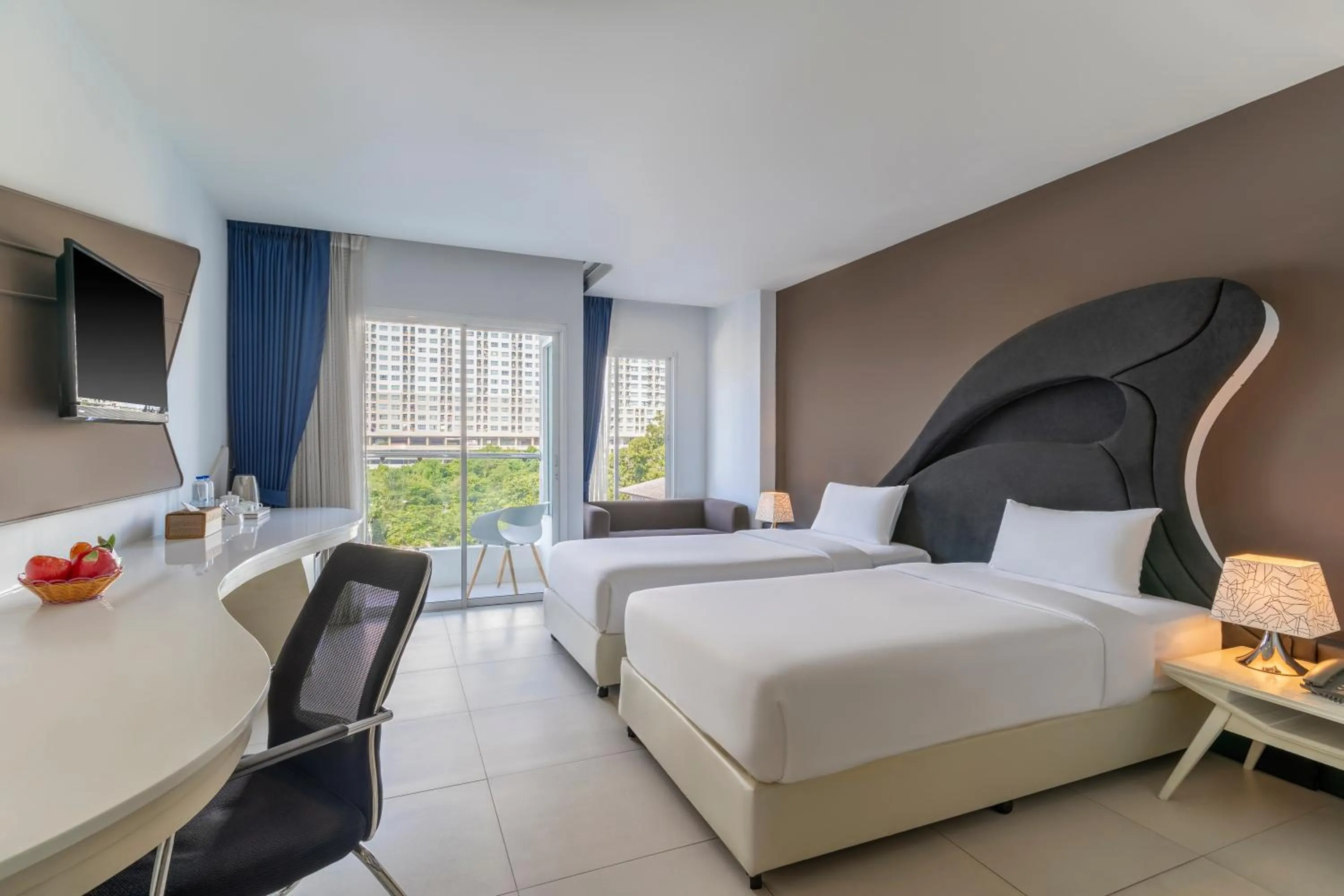 Bed in Blue Boat Hotel JC