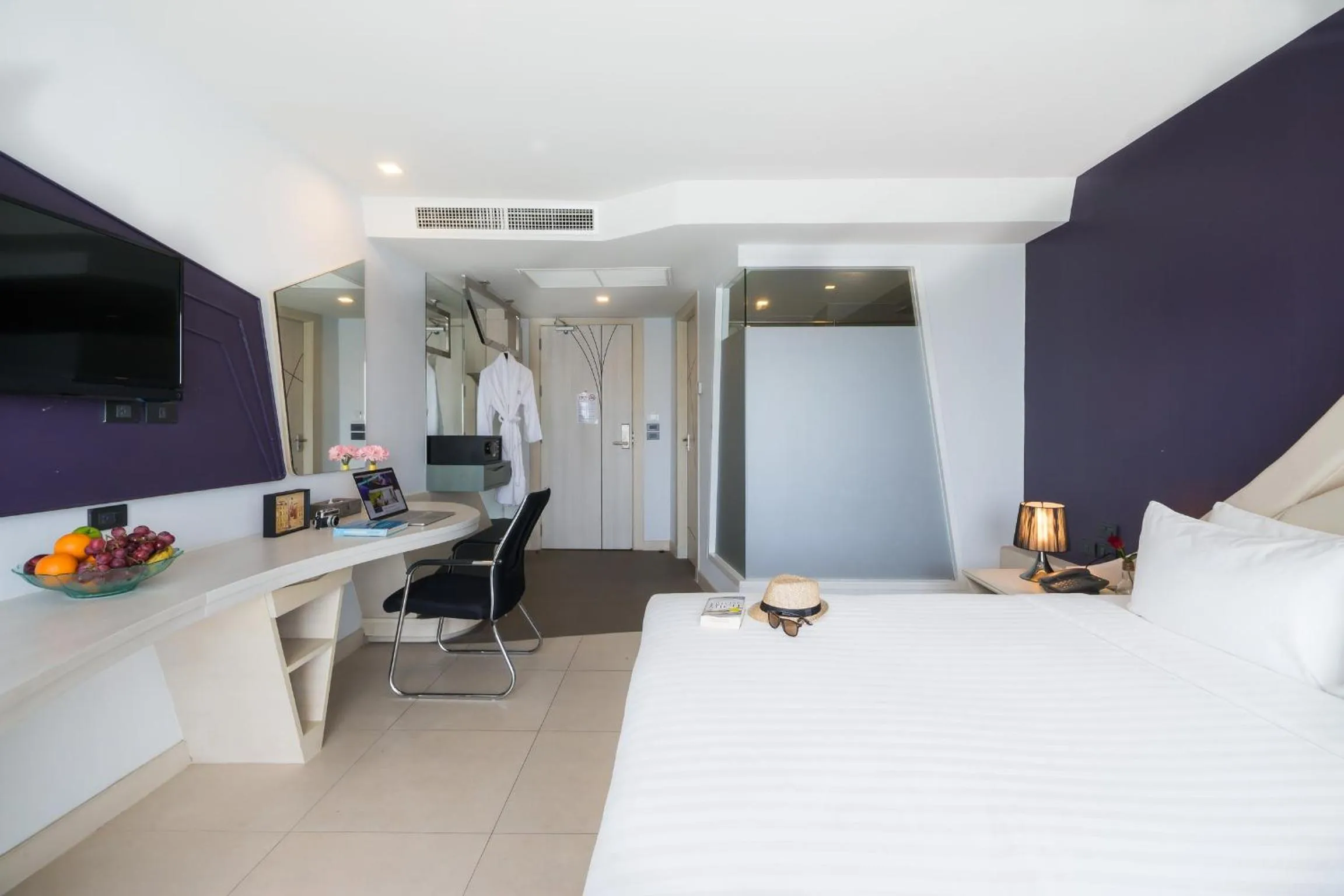 Bed in Blue Boat Hotel JC