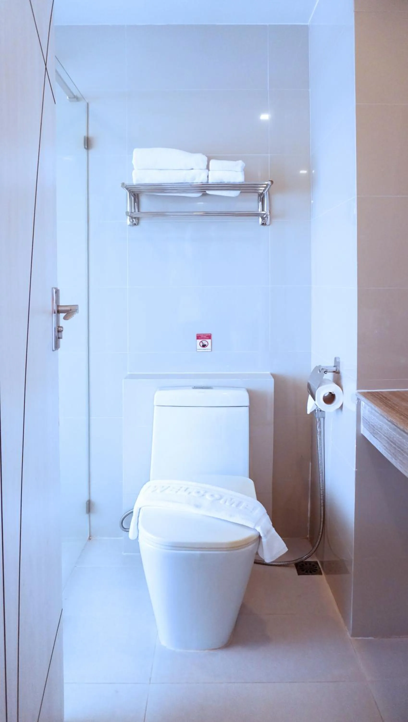 Toilet in Blue Boat Hotel JC