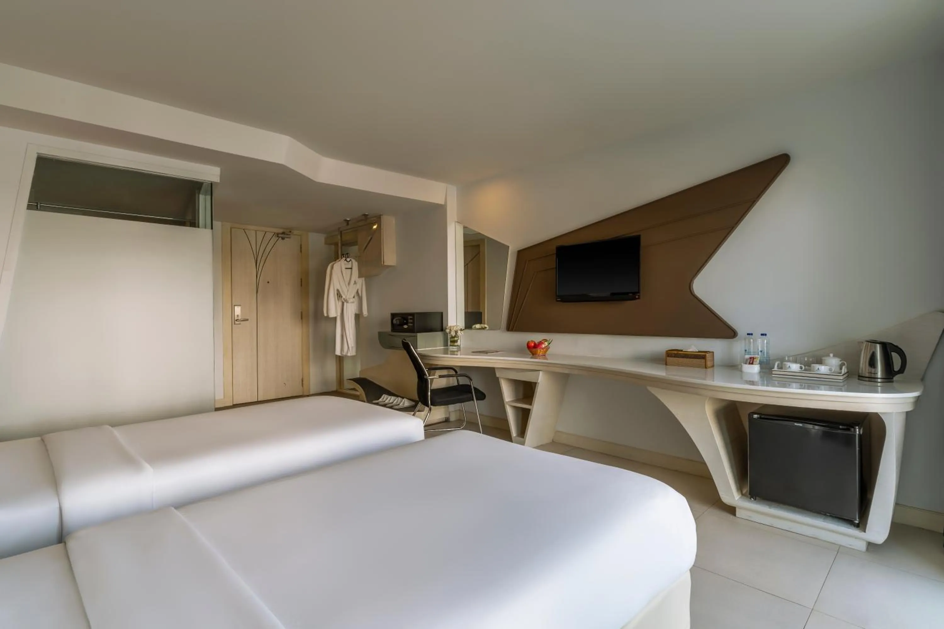 Bed in Blue Boat Hotel JC