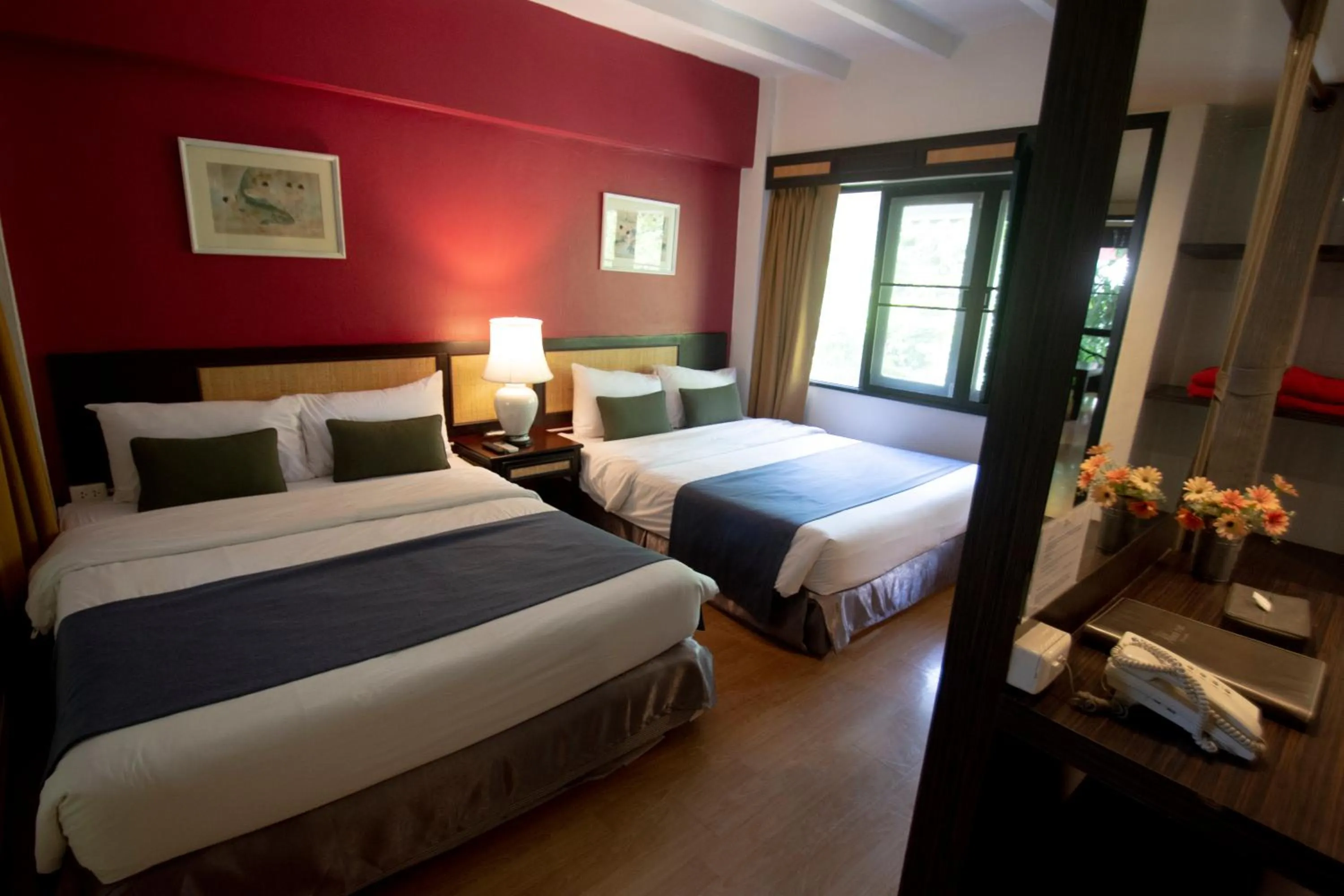 Bed in Natural Park Resort Pattaya