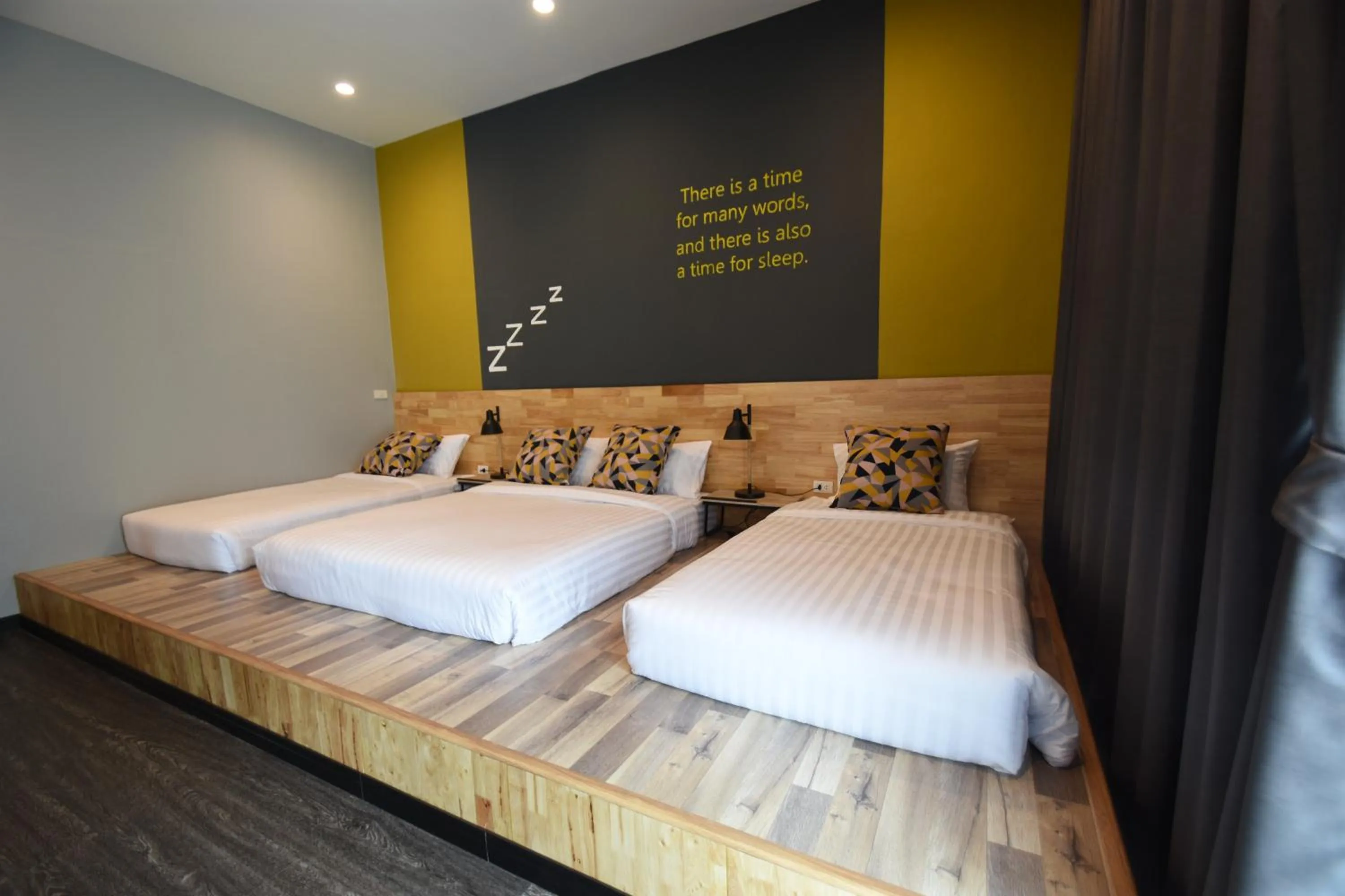 Bed in Natural Park Resort Pattaya