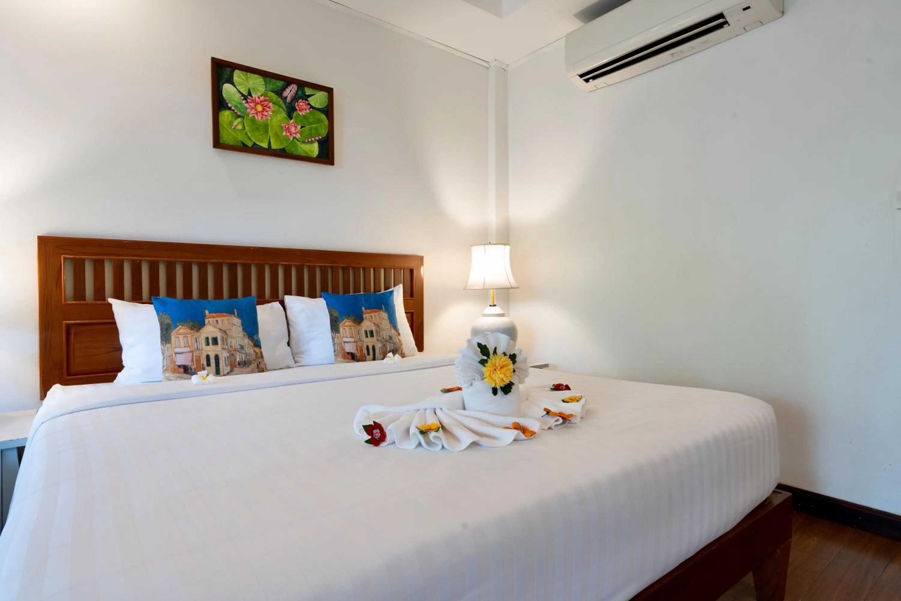 Bed in Natural Park Resort Pattaya