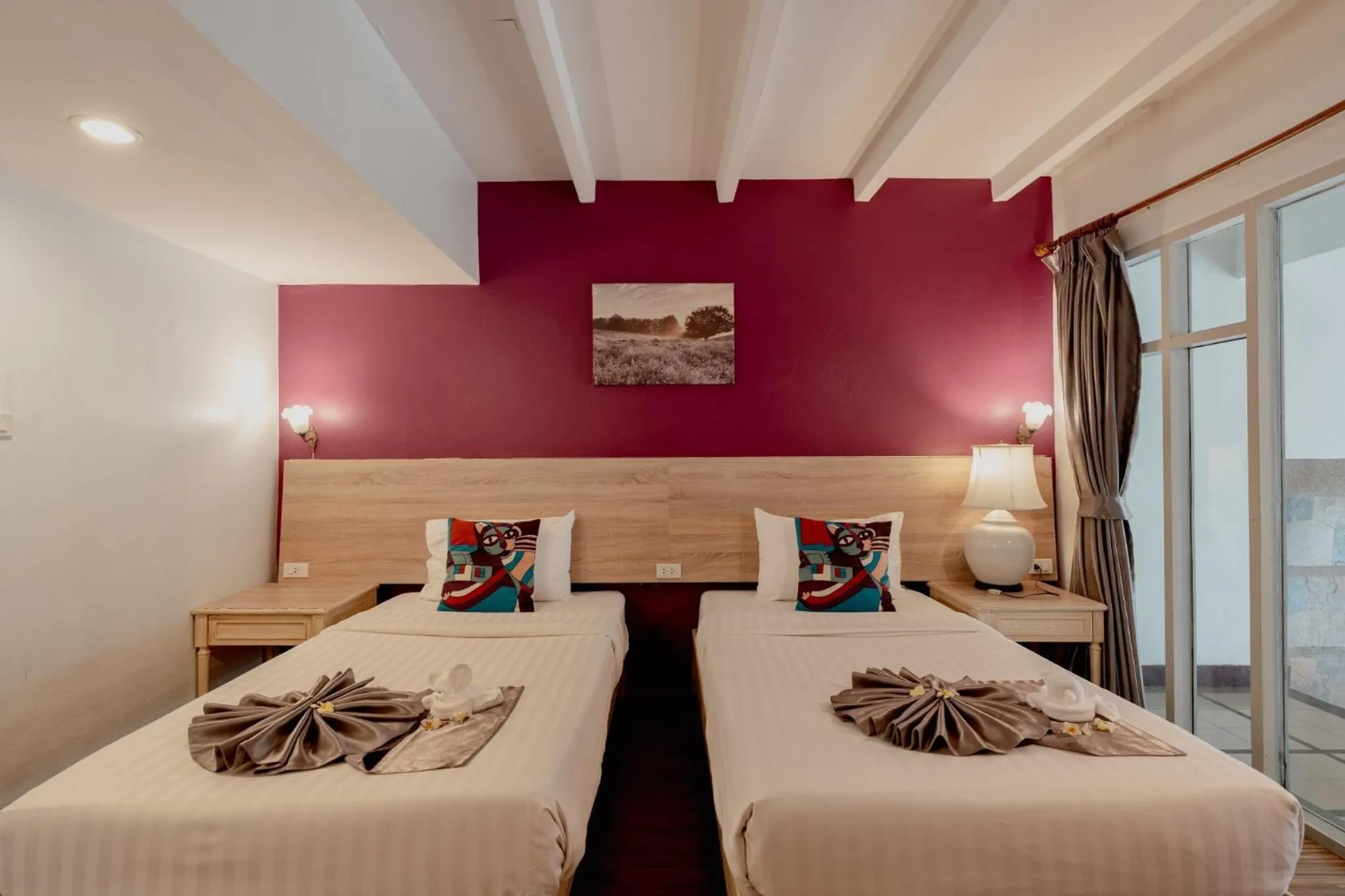 Bed in Natural Park Resort Pattaya