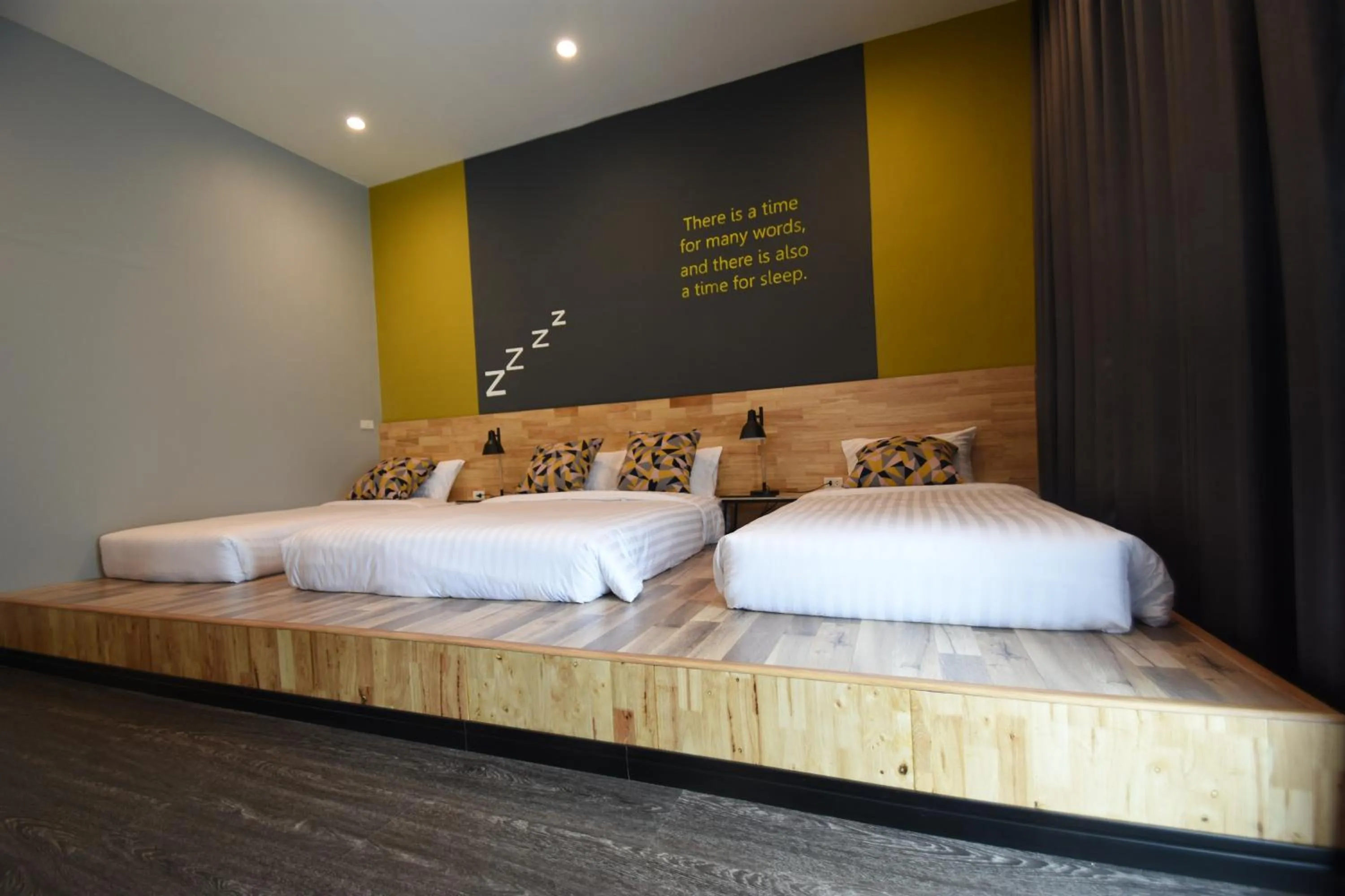 Bed in Natural Park Resort Pattaya