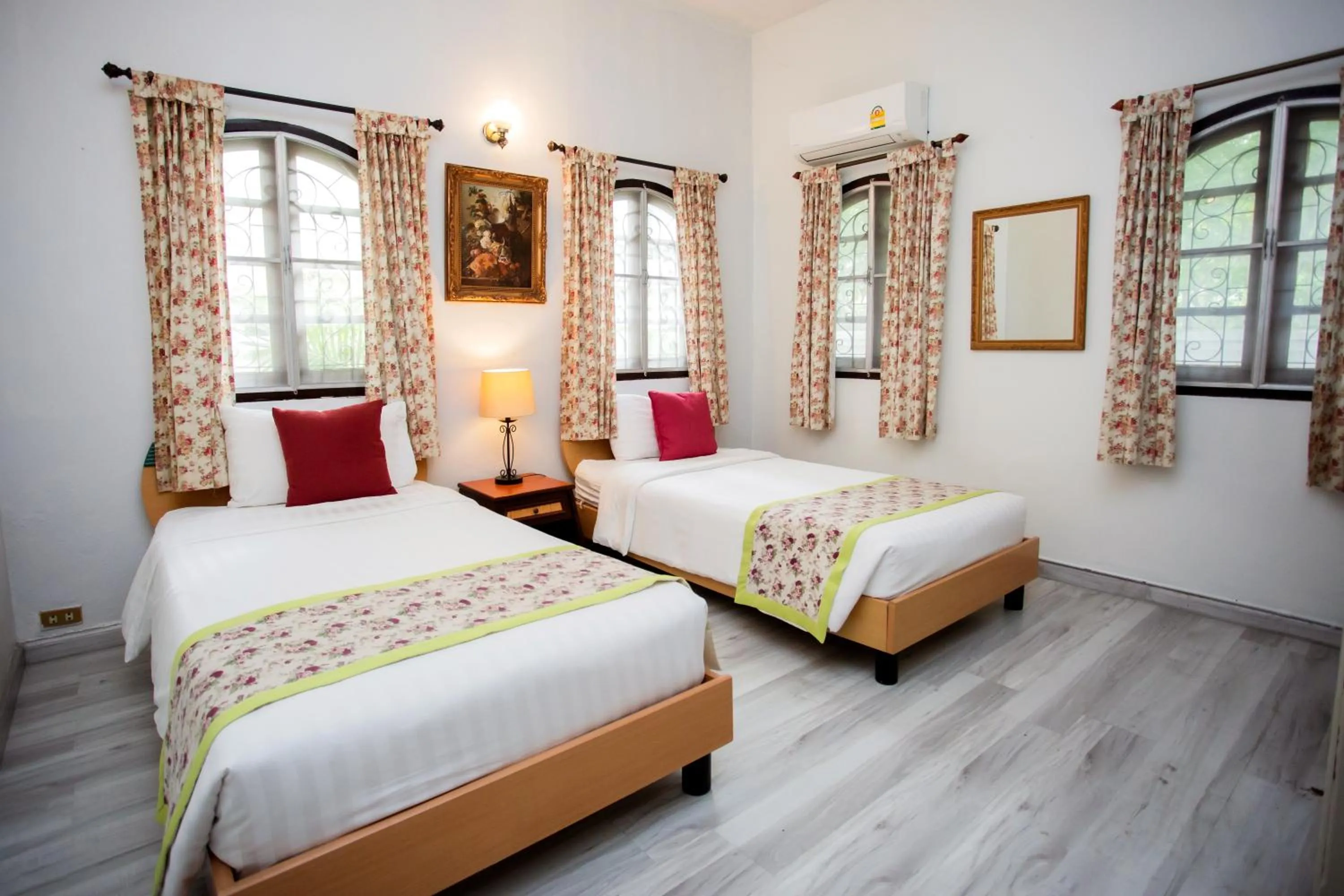 Bed in Natural Park Resort Pattaya