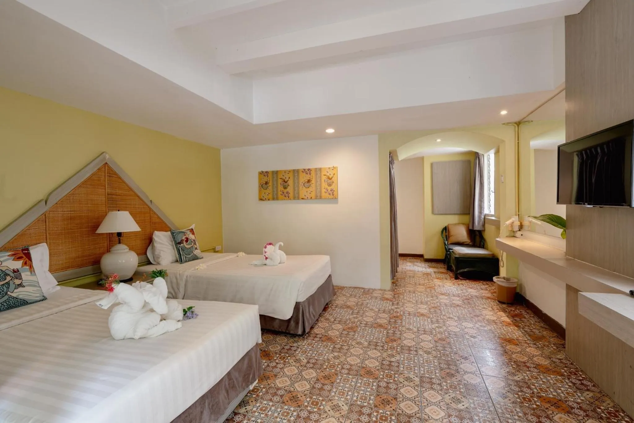 Bed in Natural Park Resort Pattaya