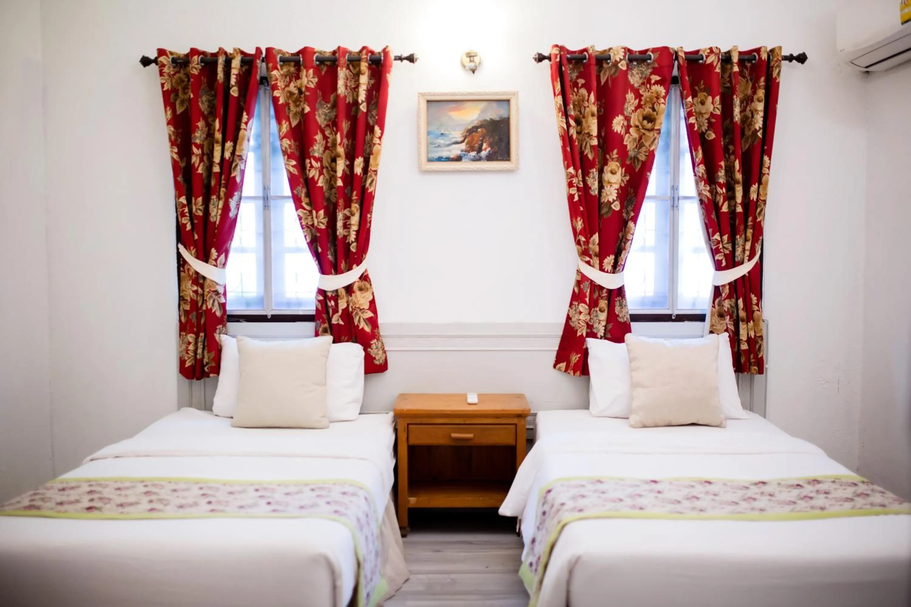 Bed in Natural Park Resort Pattaya