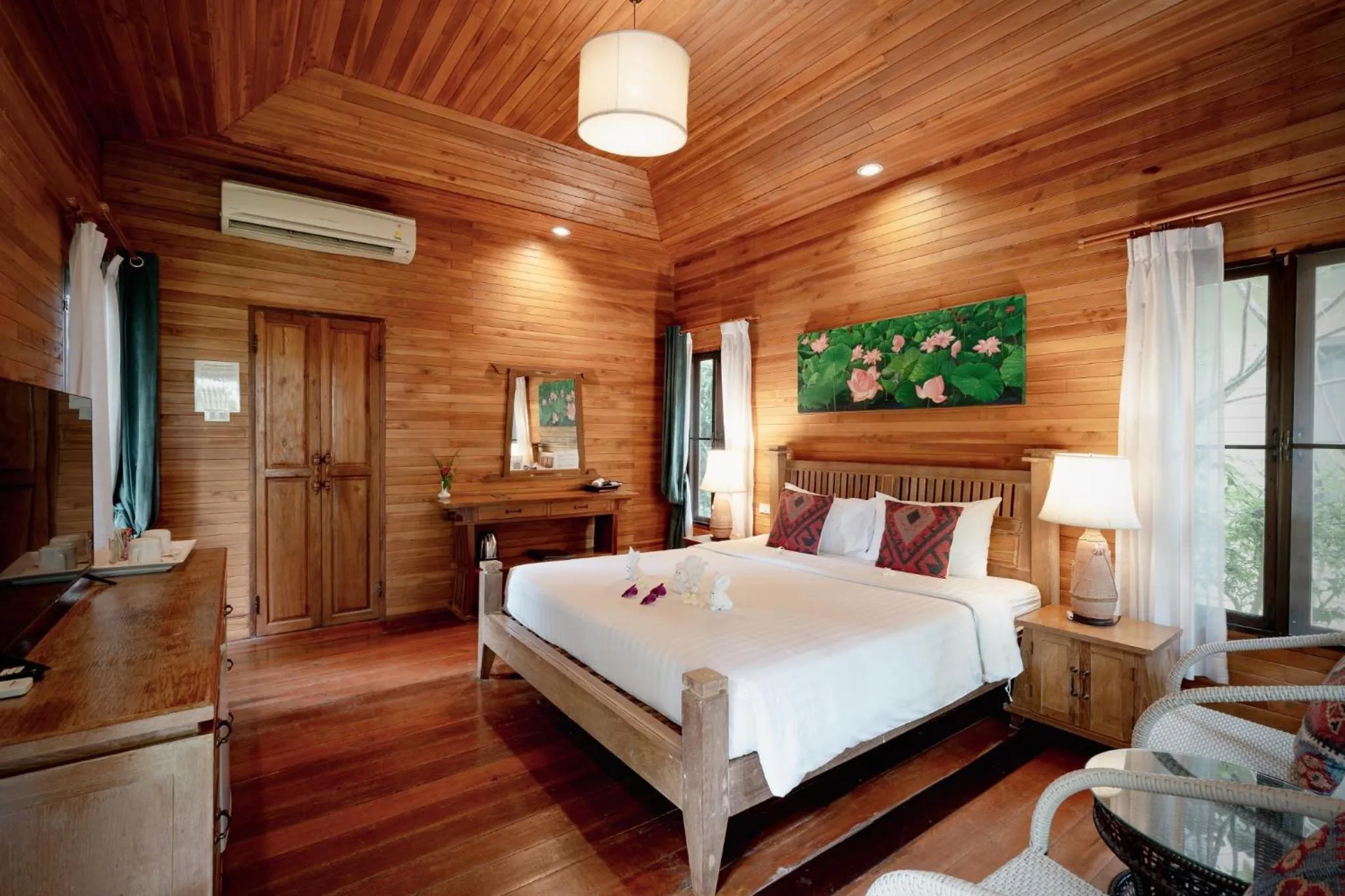 Bed in Natural Park Resort Pattaya