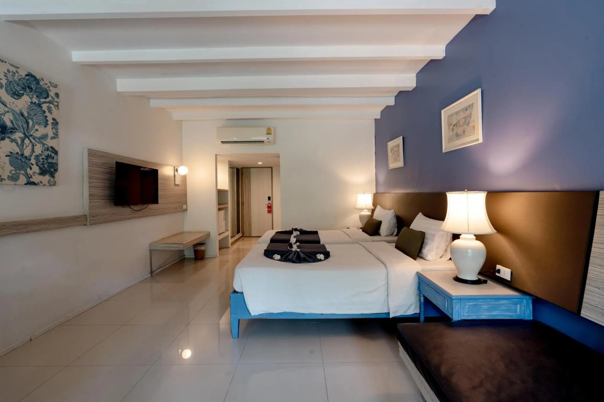 Bed in Natural Park Resort Pattaya