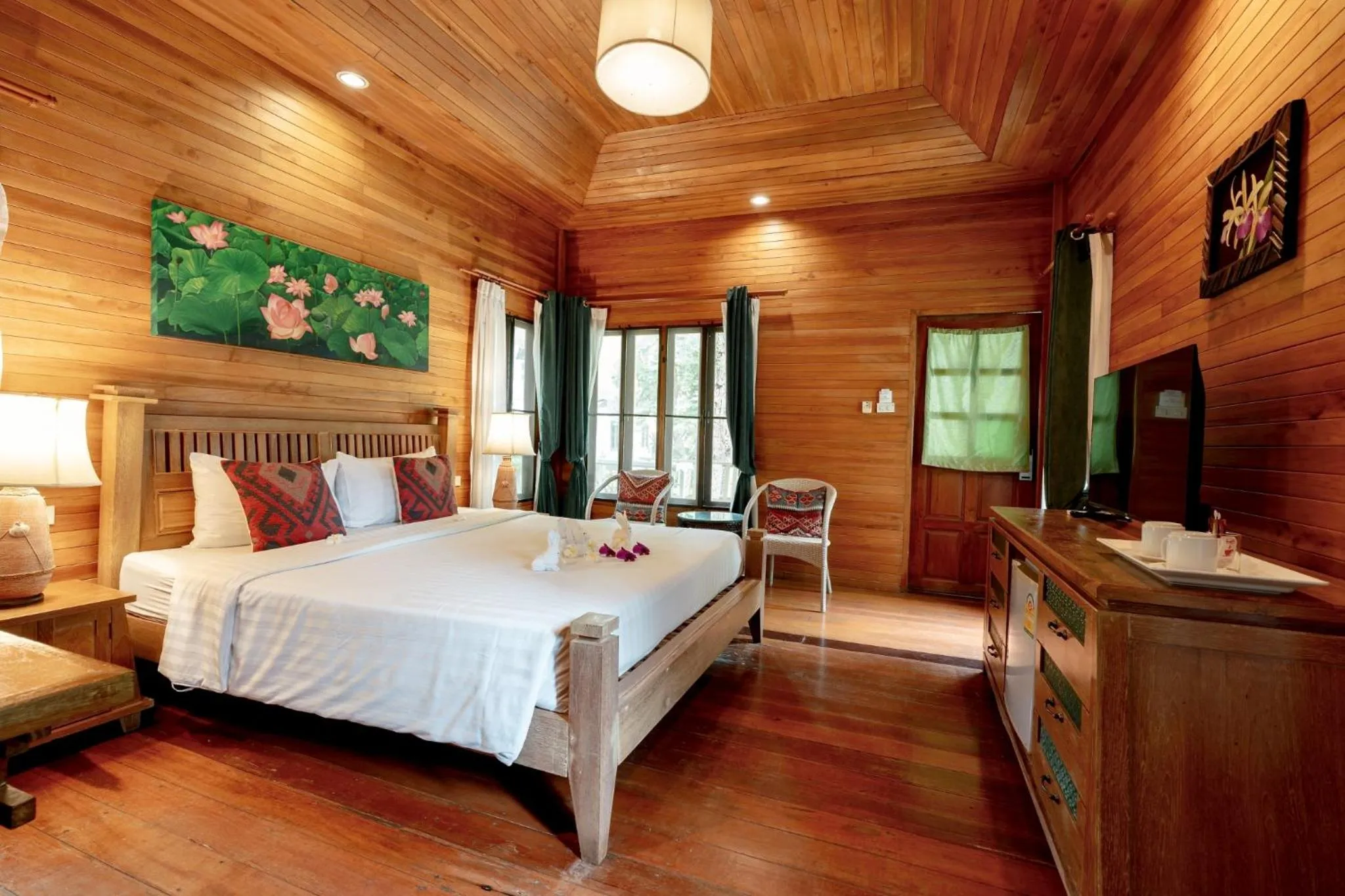 Bed in Natural Park Resort Pattaya