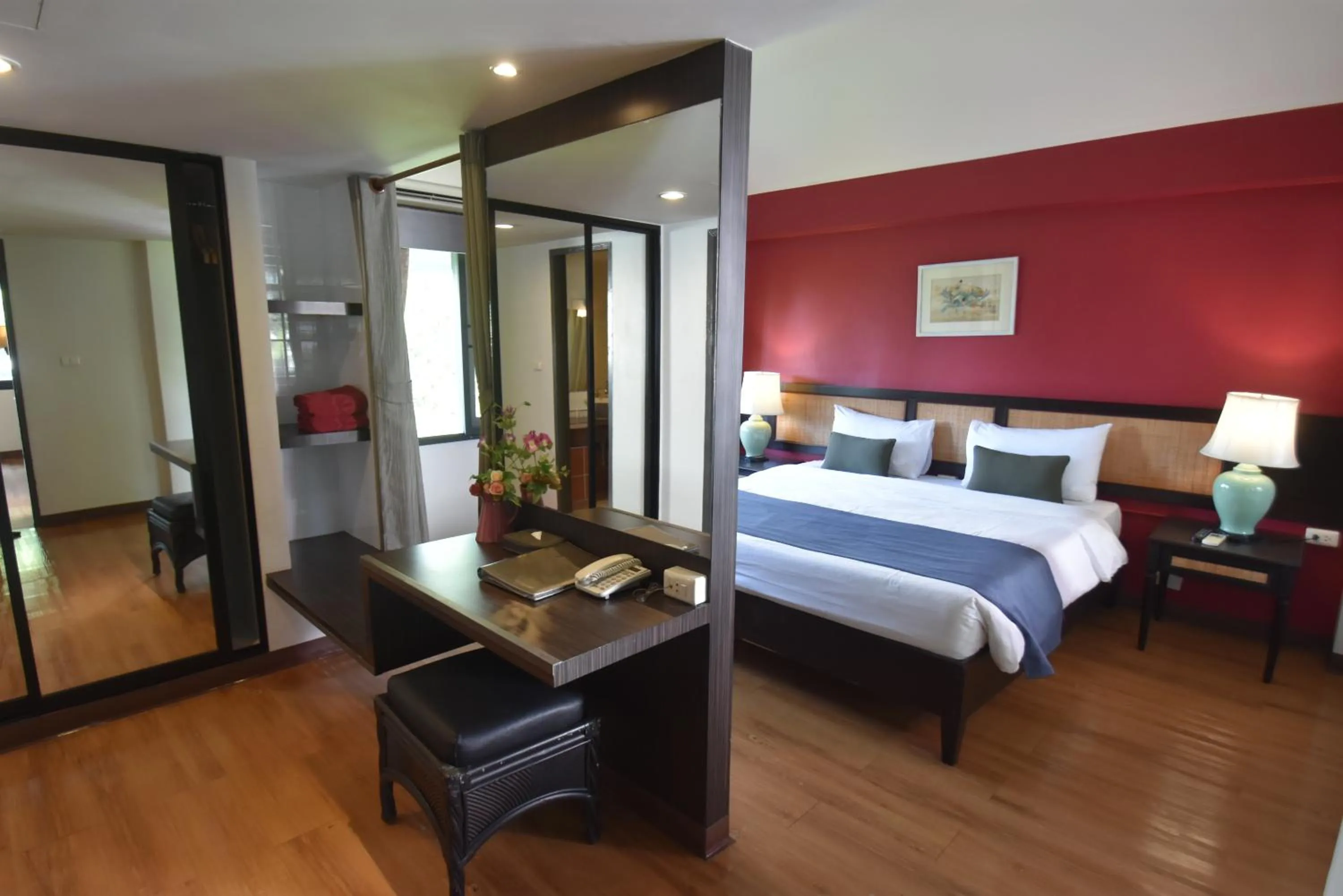 Bed in Natural Park Resort Pattaya