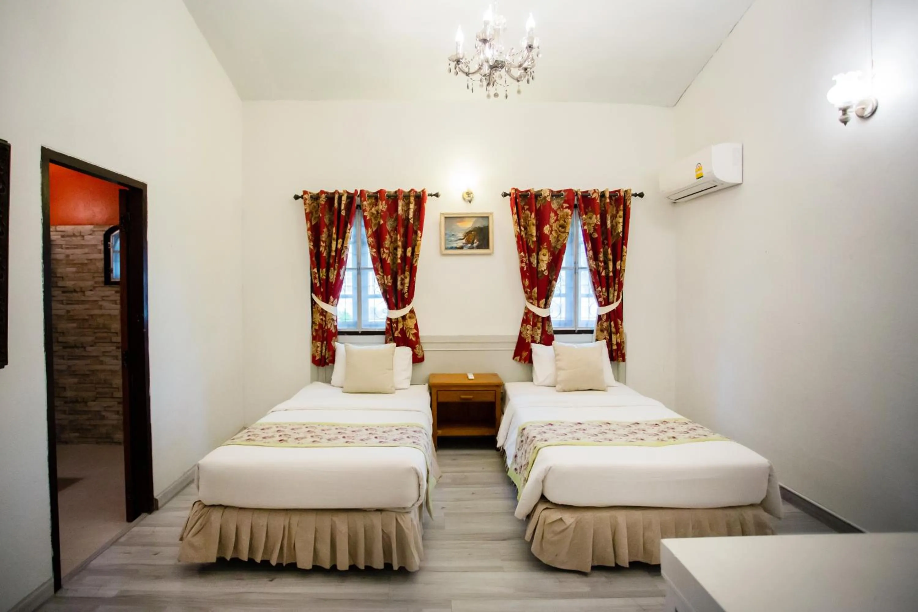 Bed in Natural Park Resort Pattaya