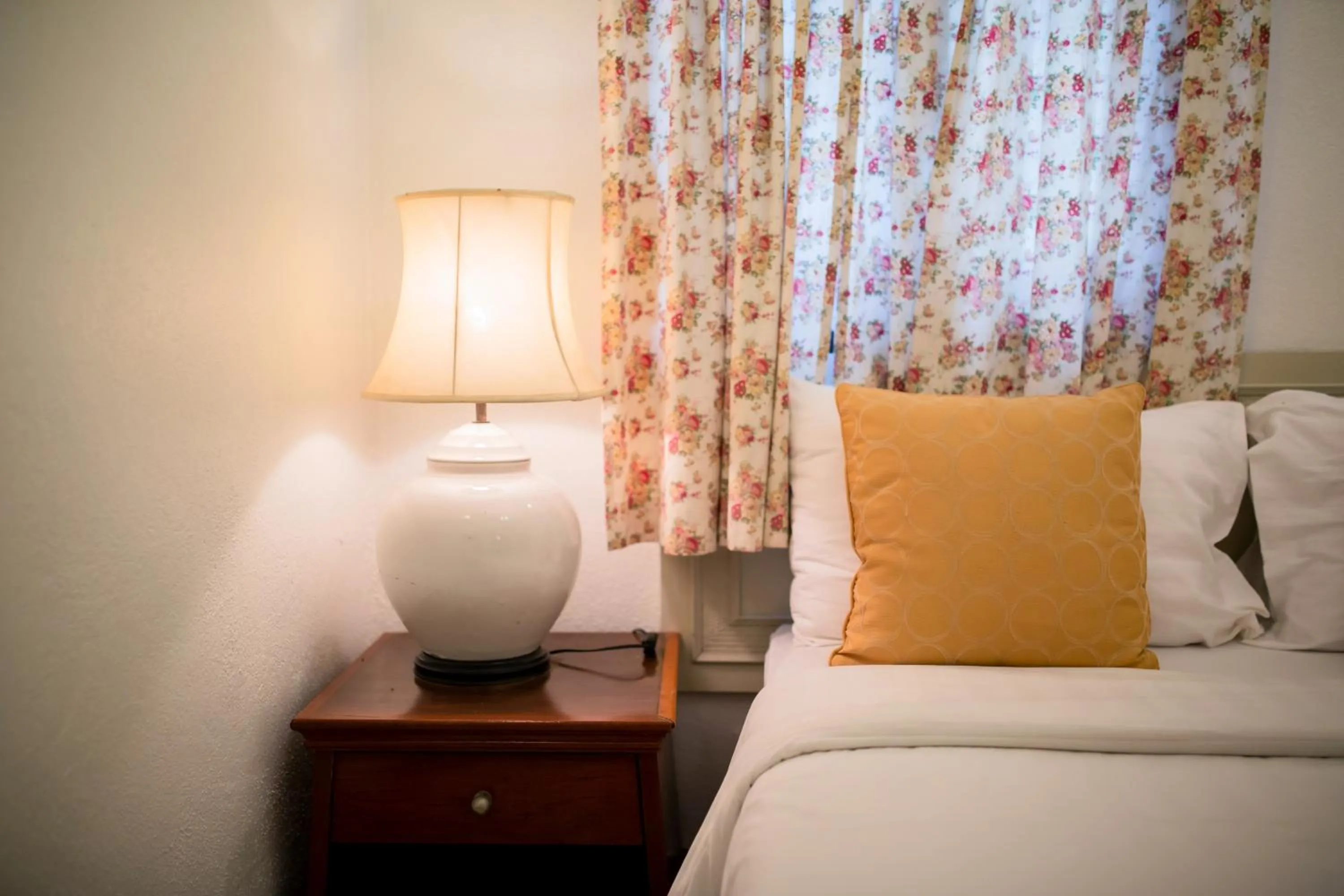 Bed in Natural Park Resort Pattaya