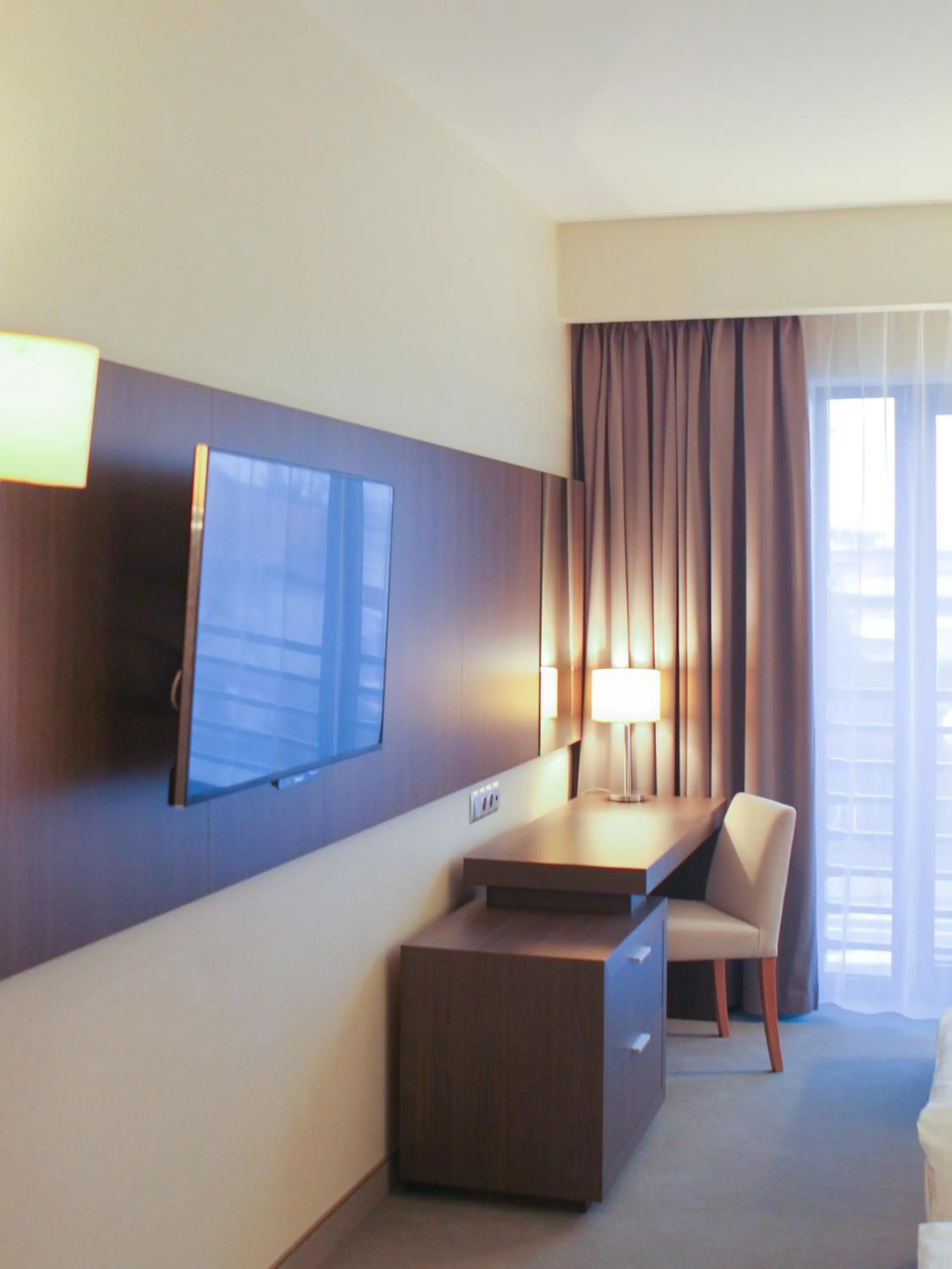 TV and multimedia, TV/Entertainment Center in Hotel Kosma