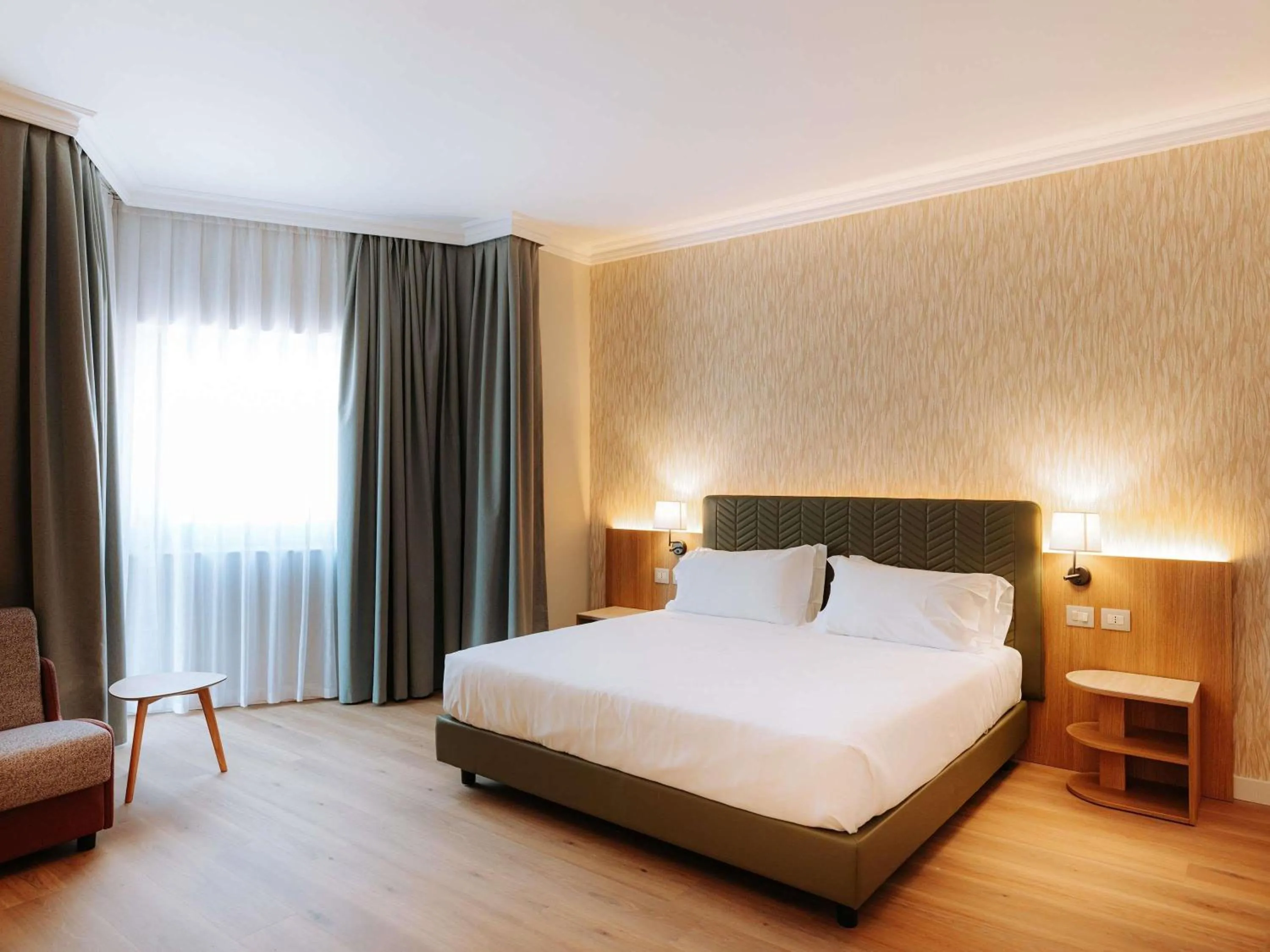 Bedroom, Bed in Mövenpick Hotel Bari