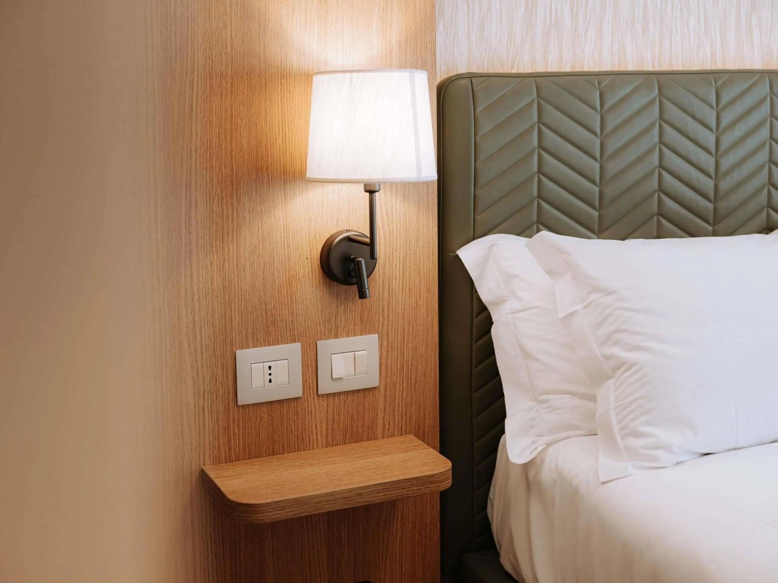 Bedroom, Bed in Mövenpick Hotel Bari