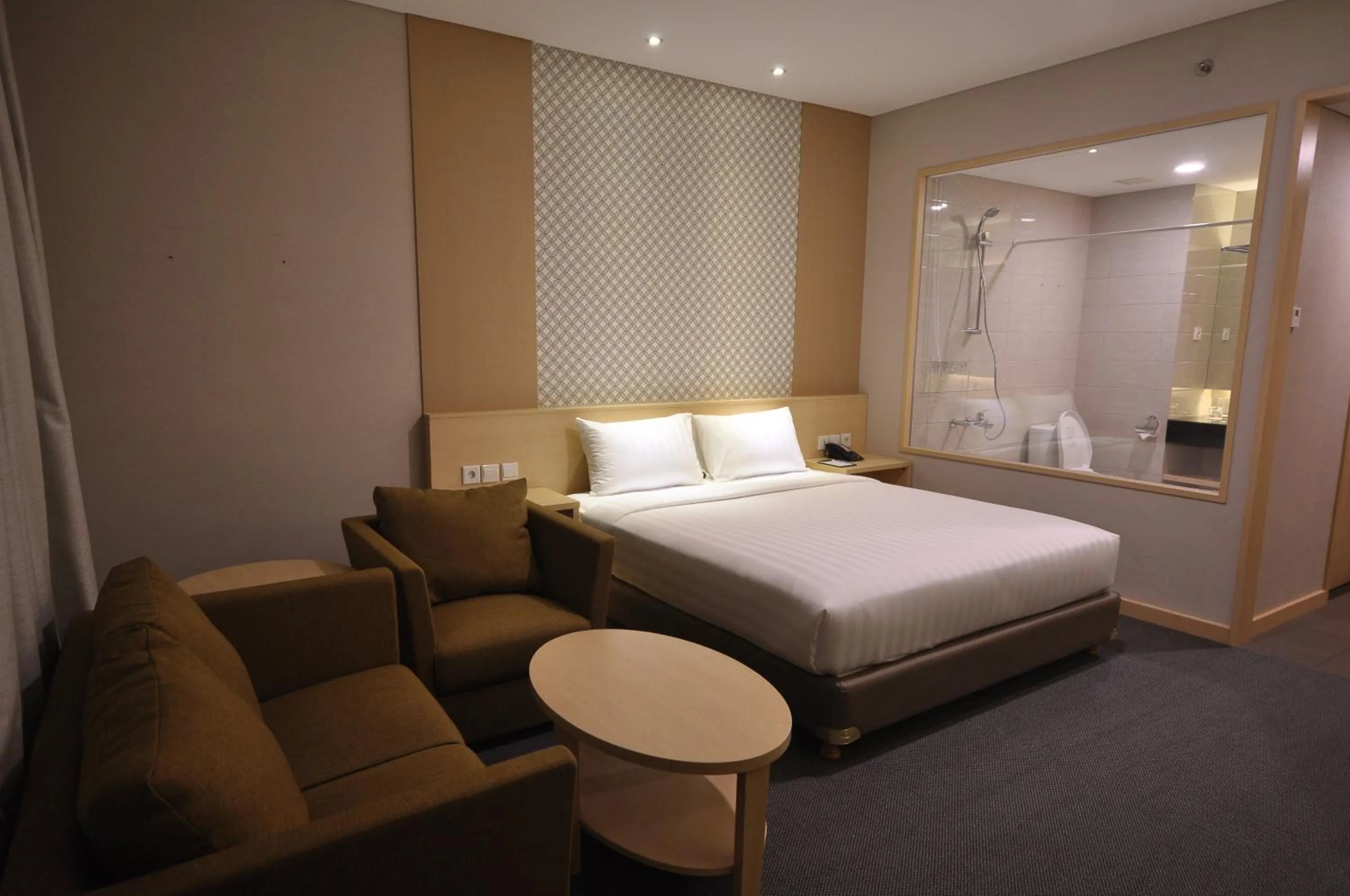 Living room, Bed in GTV Hotel