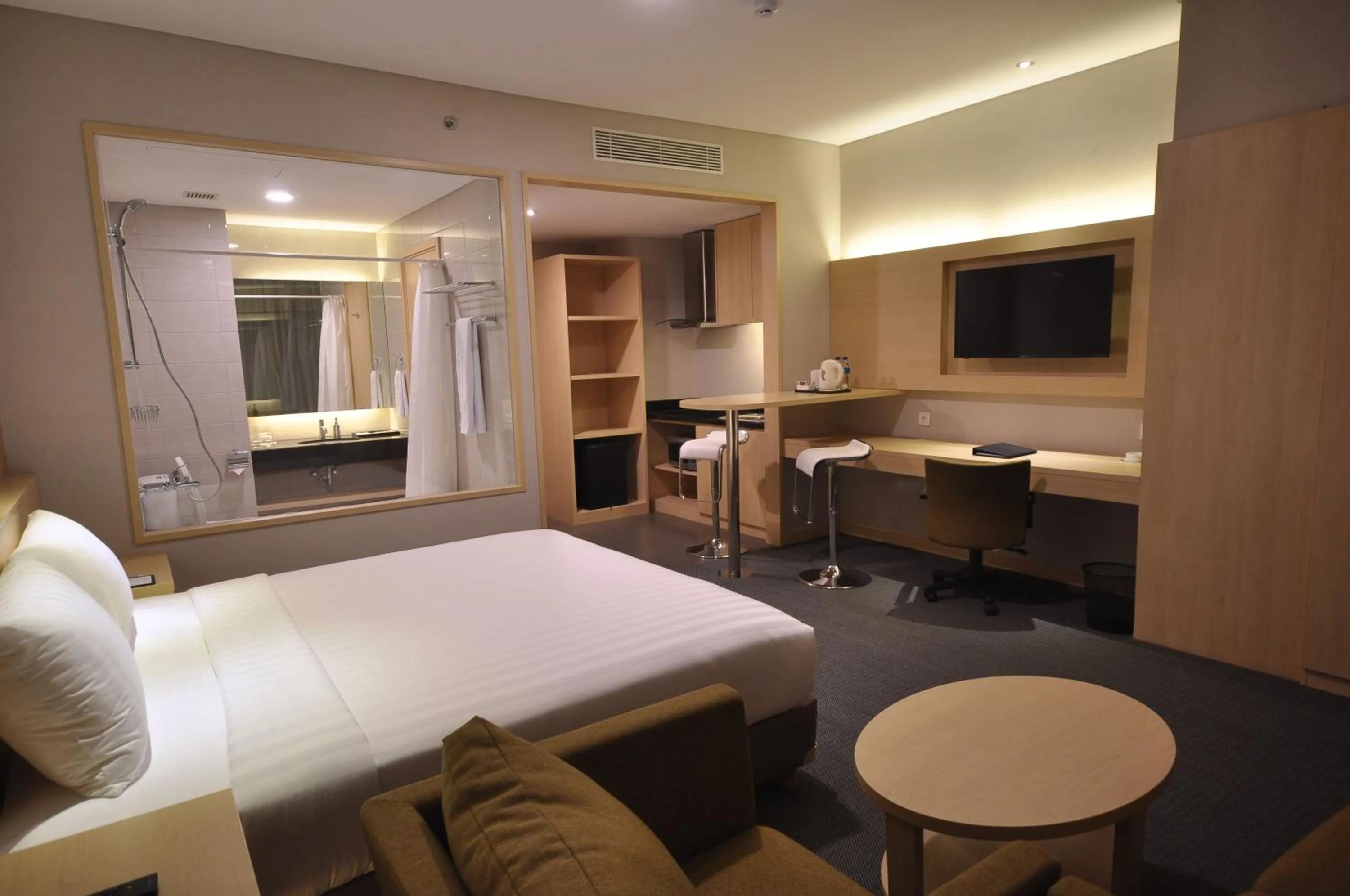 Living room, Bed in GTV Hotel