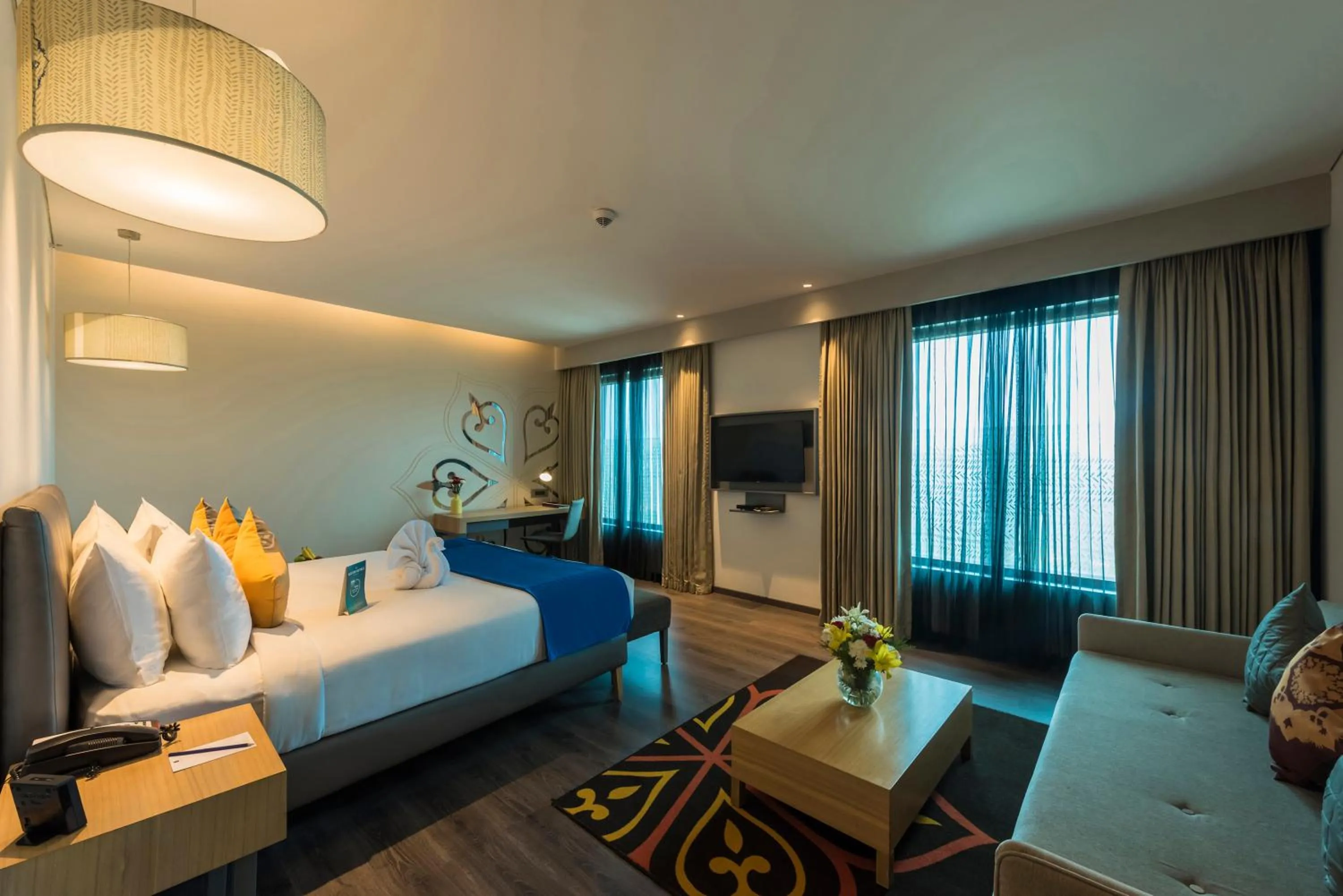 Living room, Bed in Grand Mercure Mysore - An Accor Brand