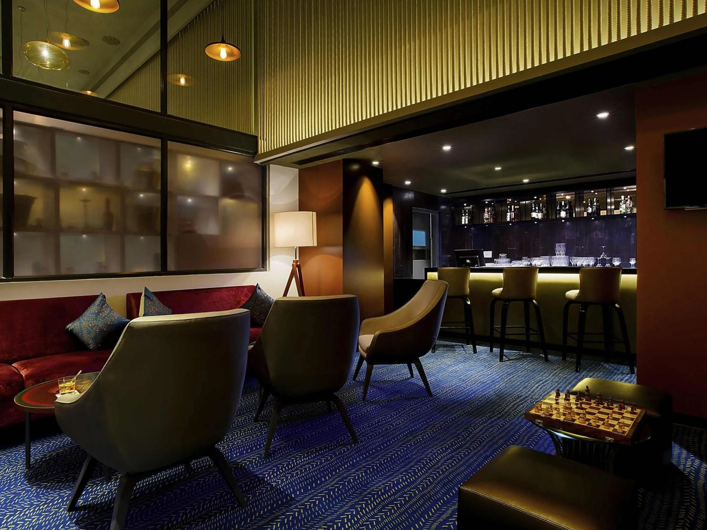 Lounge or bar in Grand Mercure Mysore - An Accor Brand
