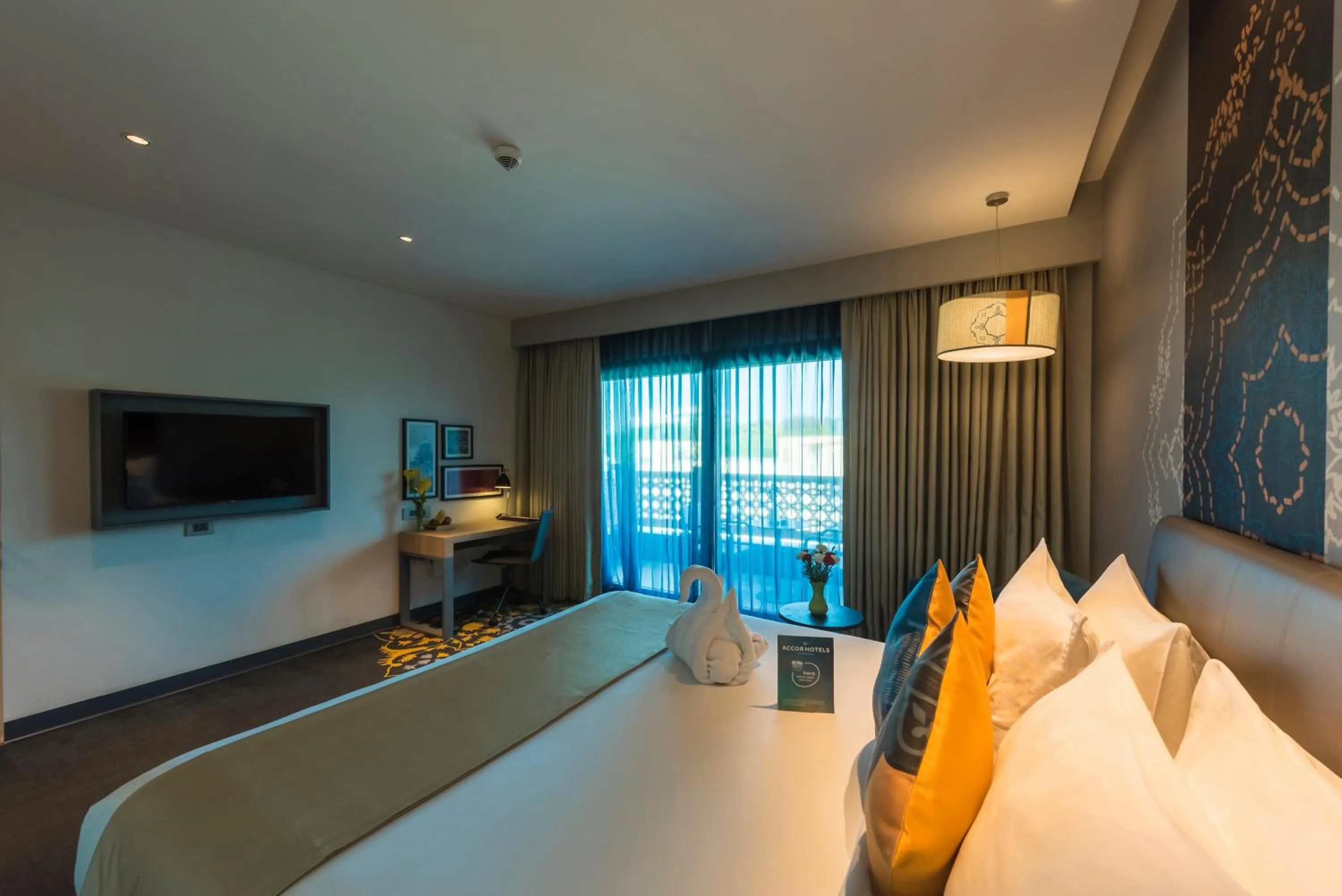 Photo of the whole room, Bed in Grand Mercure Mysore - An Accor Brand